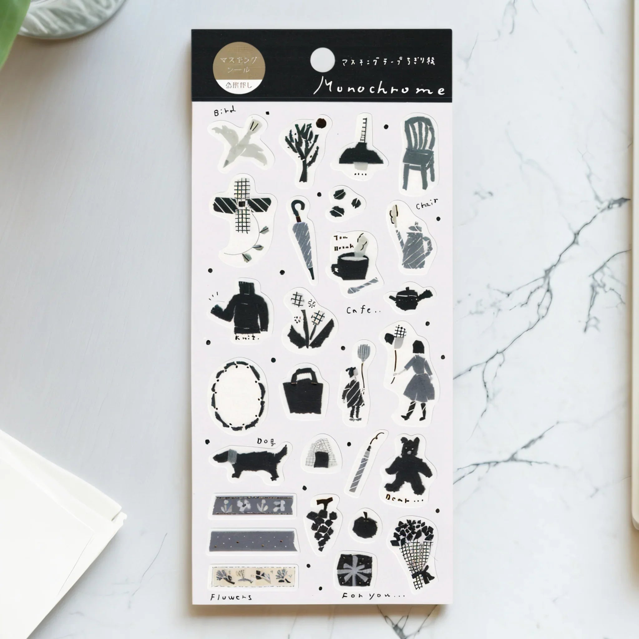 Japanese sticker sheet with monochrome geometric and cultural designs, full sheet view showing complete layout and print