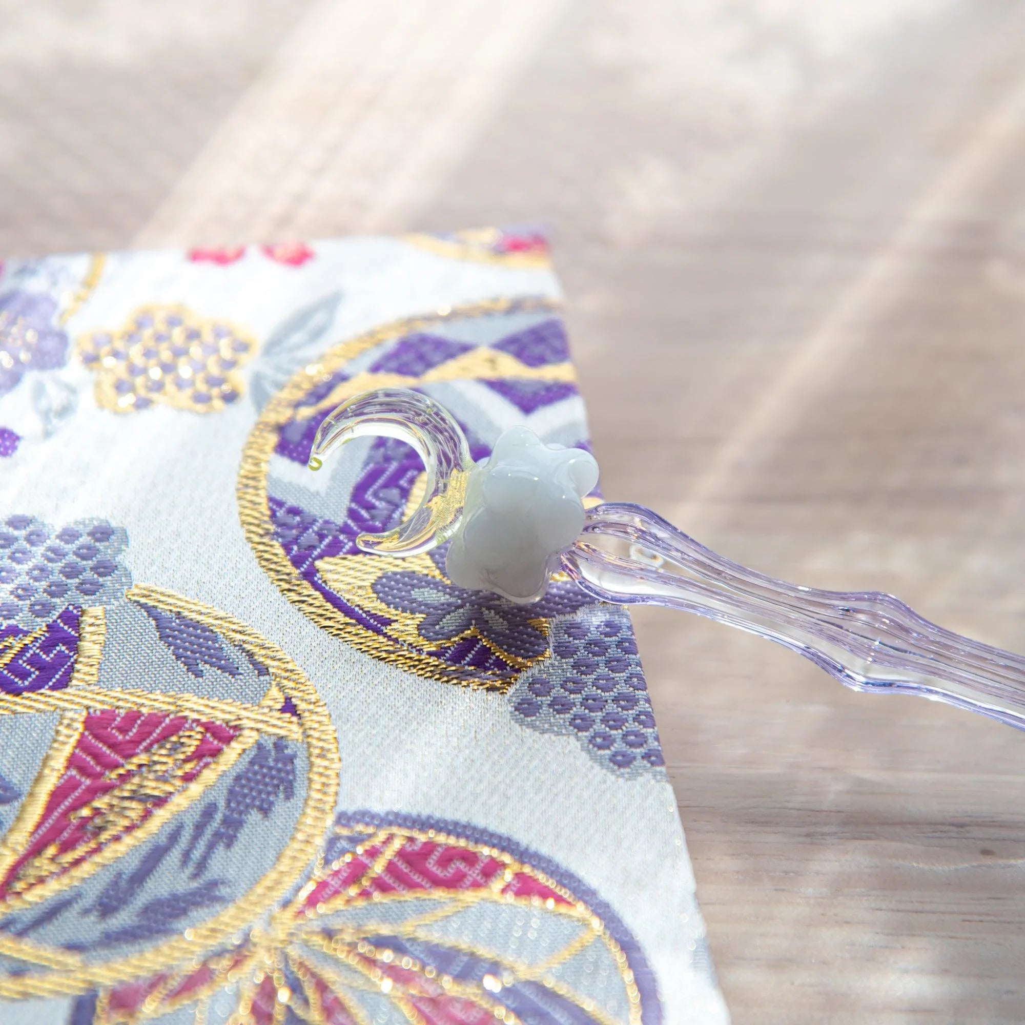 Japanese glass dip pen with white cloud topper on purple iridescent barrel, full-length product display shot