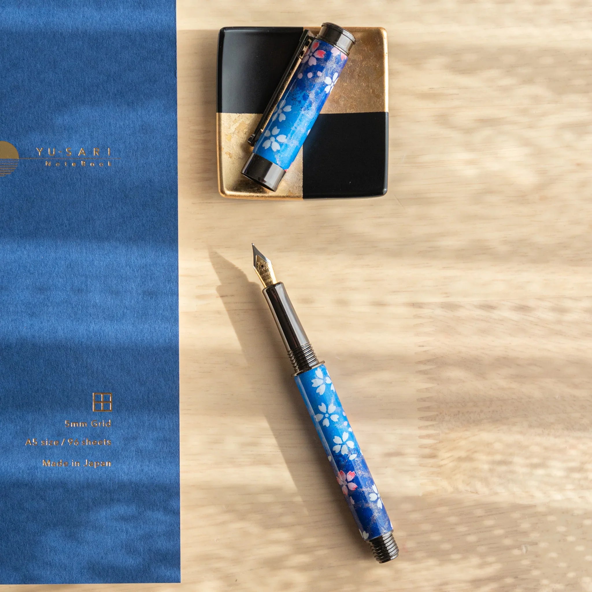 Moonlit Sakura Mino washi fountain pen cap and metallic clip with decorative gold metal trim and details with nib