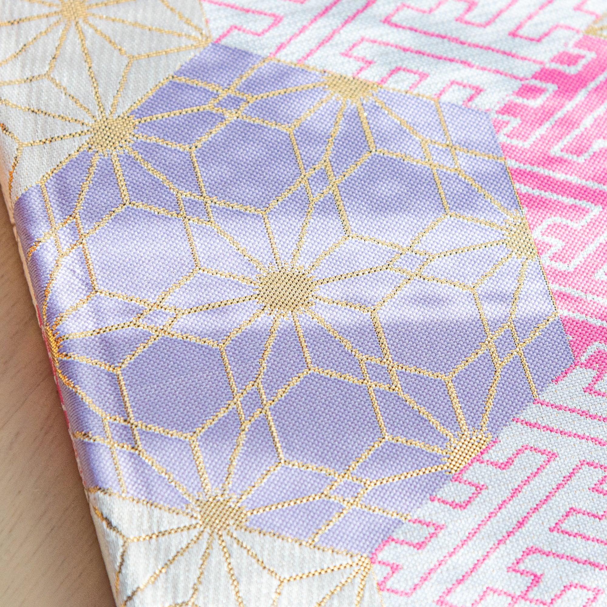 Nishijin Auspicious Gathered Crests B6 journal, spine with gold embossing and textile craft detail with binding