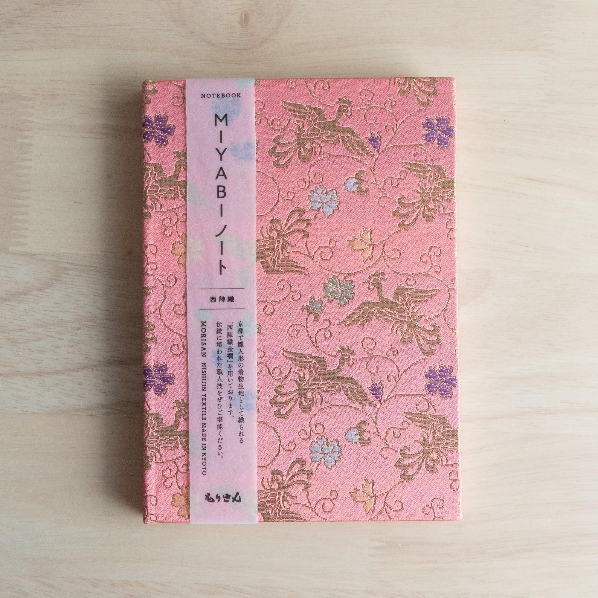 Pink Nishijin textile Japanese notebook with pink phoenix cover and belly band reading MIYABI Notebook MORISAN KYOTO