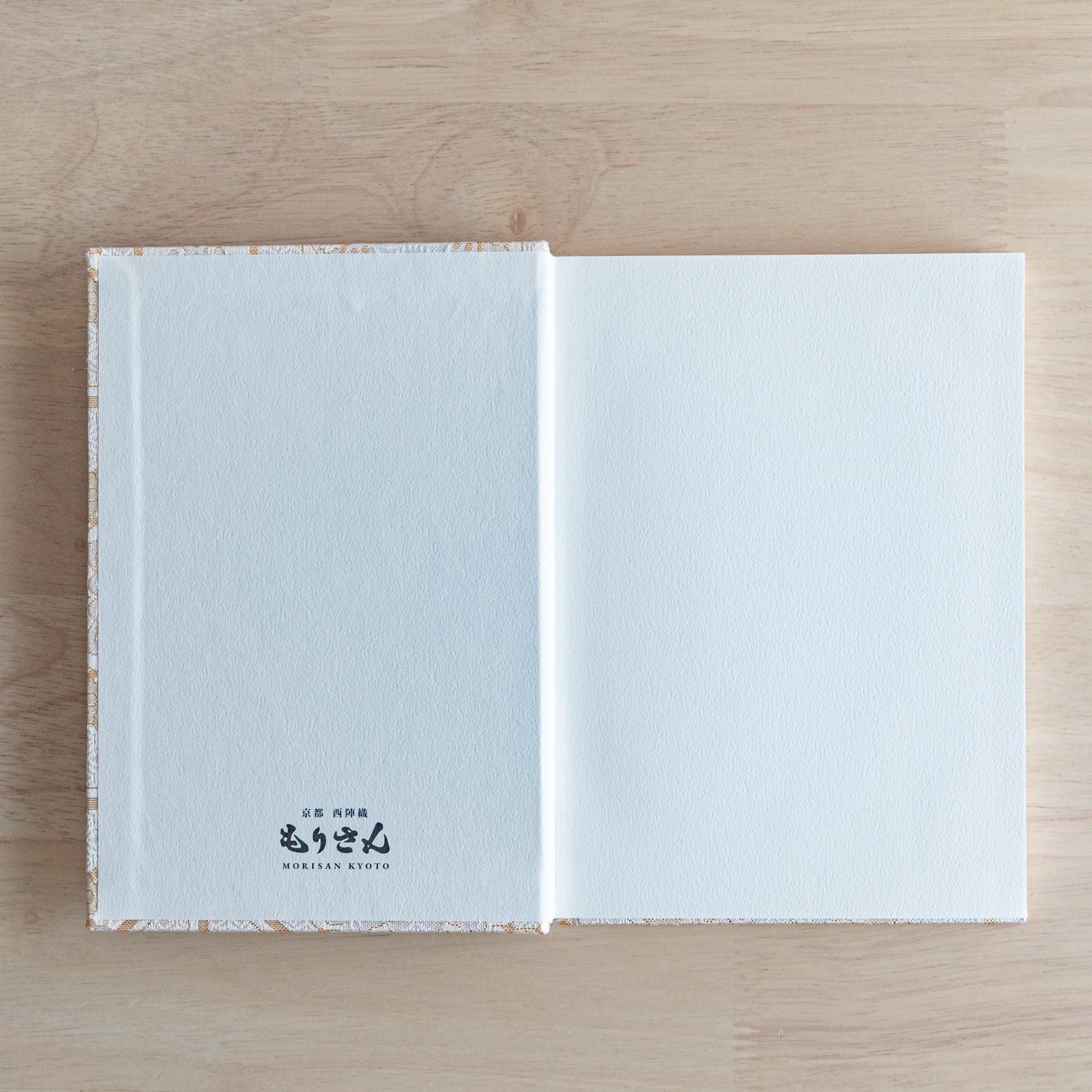 Nishijin textile B6 journal, fully opened showing quality paper and Shokkou brocade textile with binding