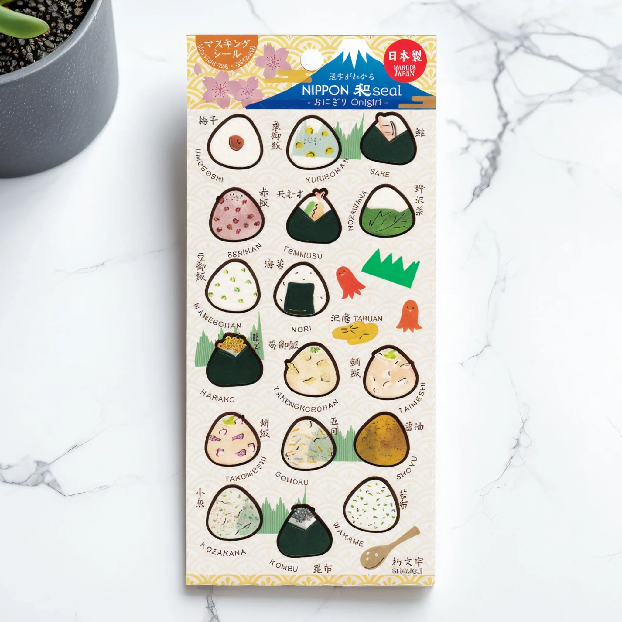 Onigiri Iyo Washi Sticker Sheet with Japanese rice ball designs and triangular shaped patterns in varied colors