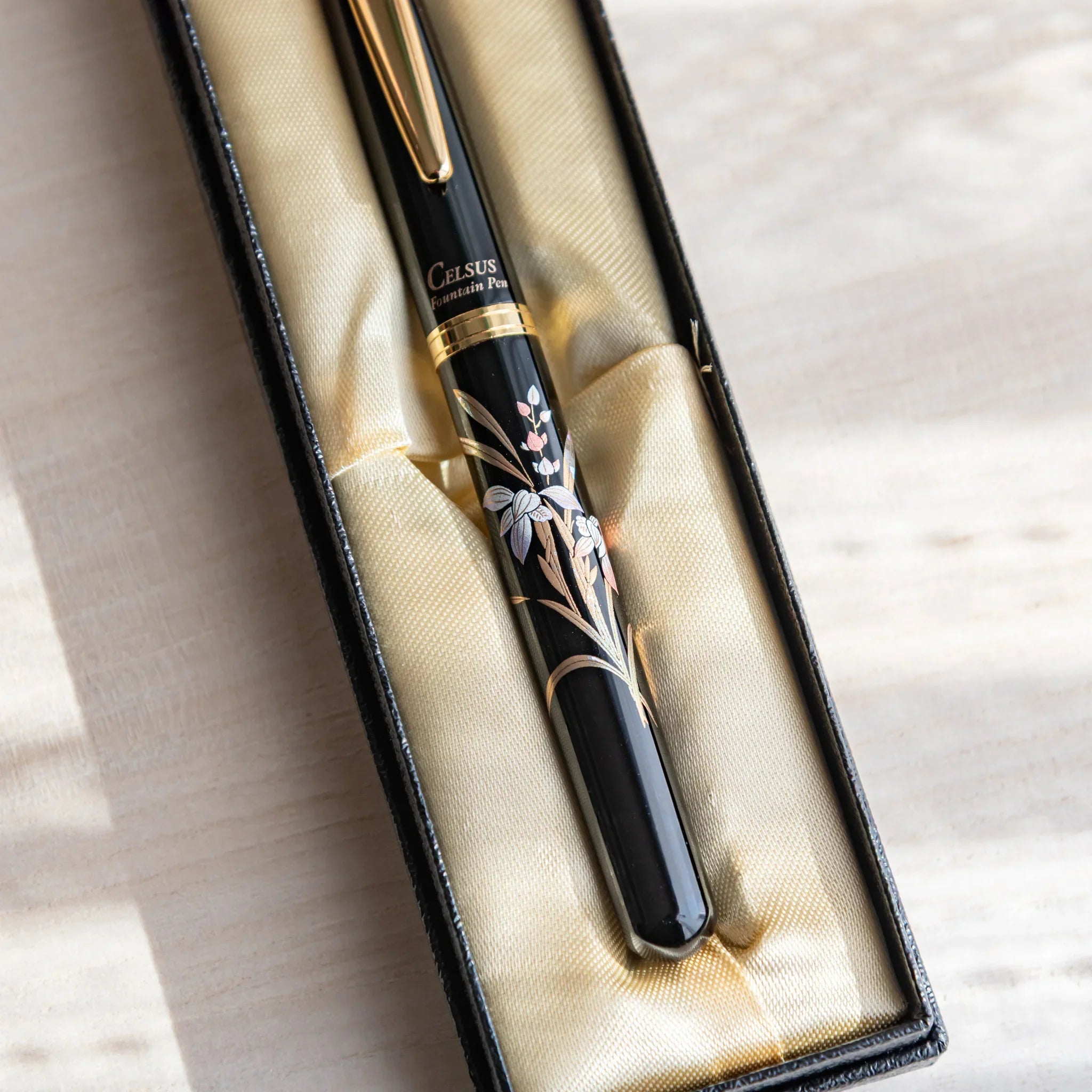 Orchid flower Yamanaka fountain pen with lacquer design shown in composition displayed composition view