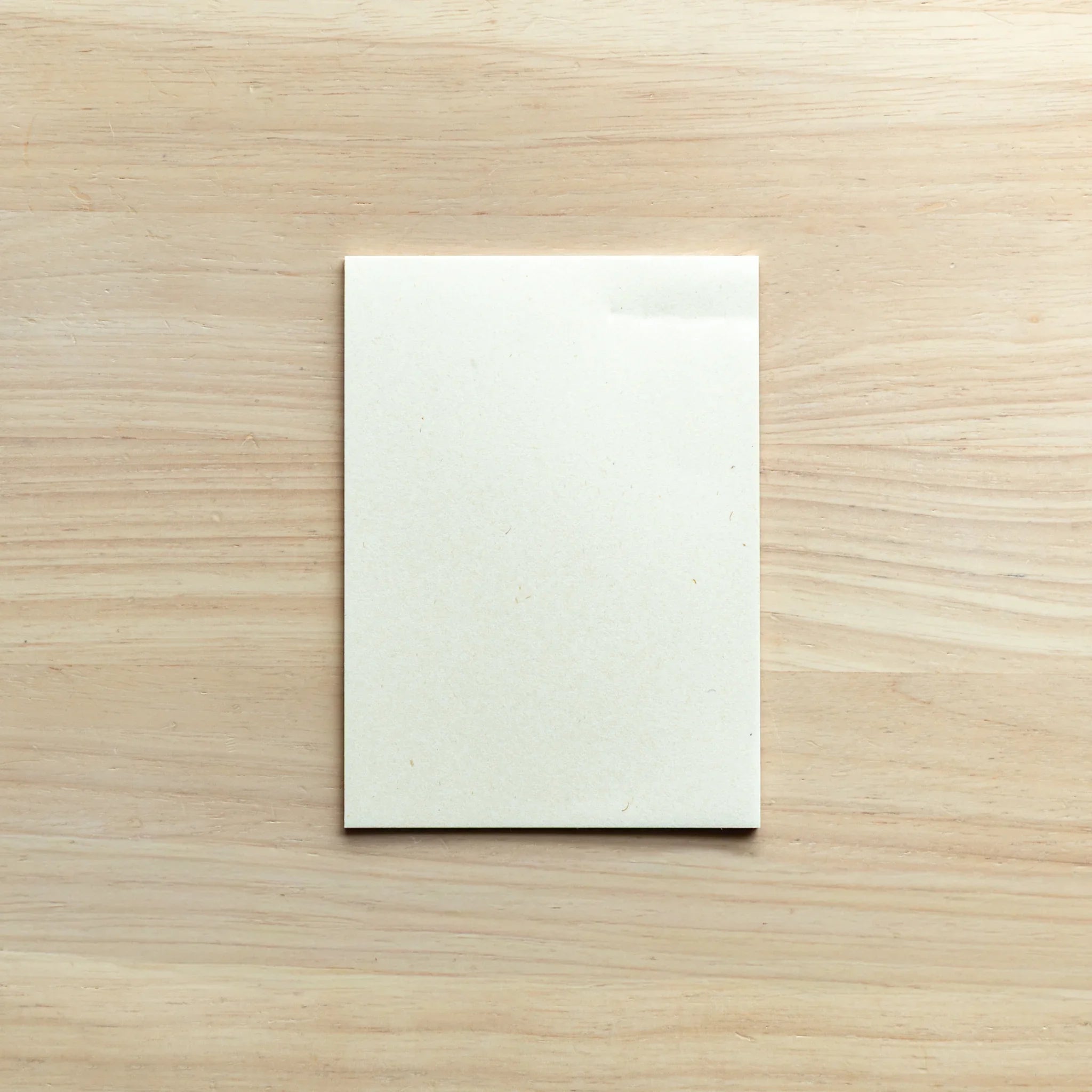 Stacked washi paper pads carefully arranged showing visible thickness demonstrating substantial paper weight quality