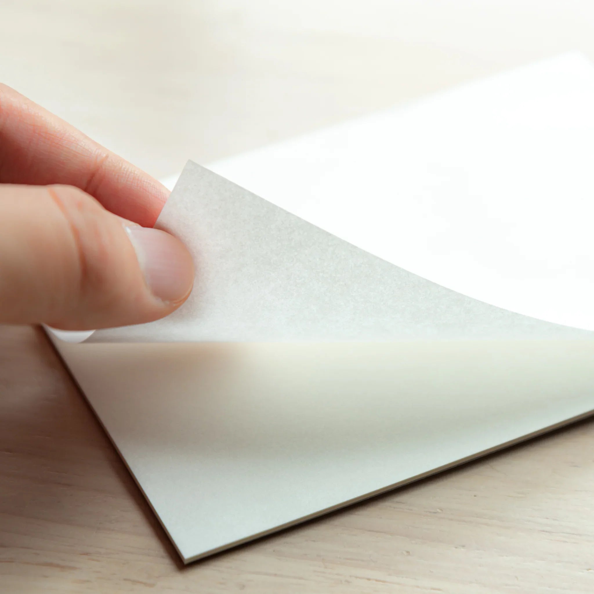 Multiple onionskin paper sheets grouped together displaying complete Paper Tasting volume two paper collection