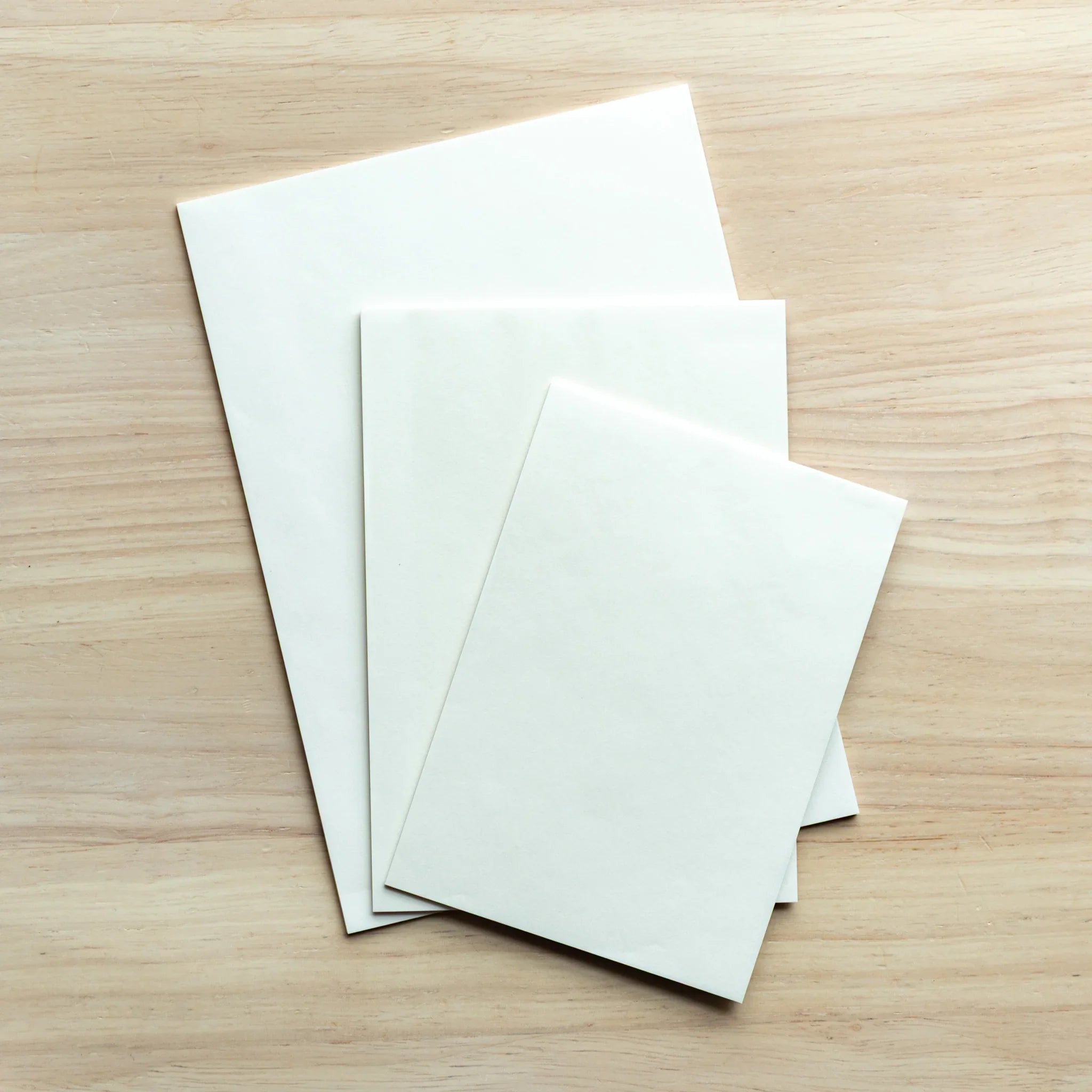 Single onionskin paper sheet displayed showing remarkable thinness and semi-transparent quality of the paper