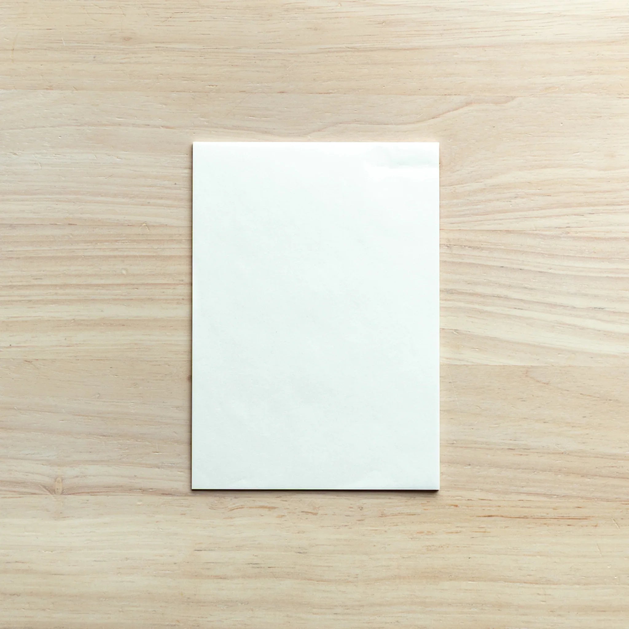 Stacked onionskin paper pads organized showing multiple thin paper varieties and paper consistency throughout