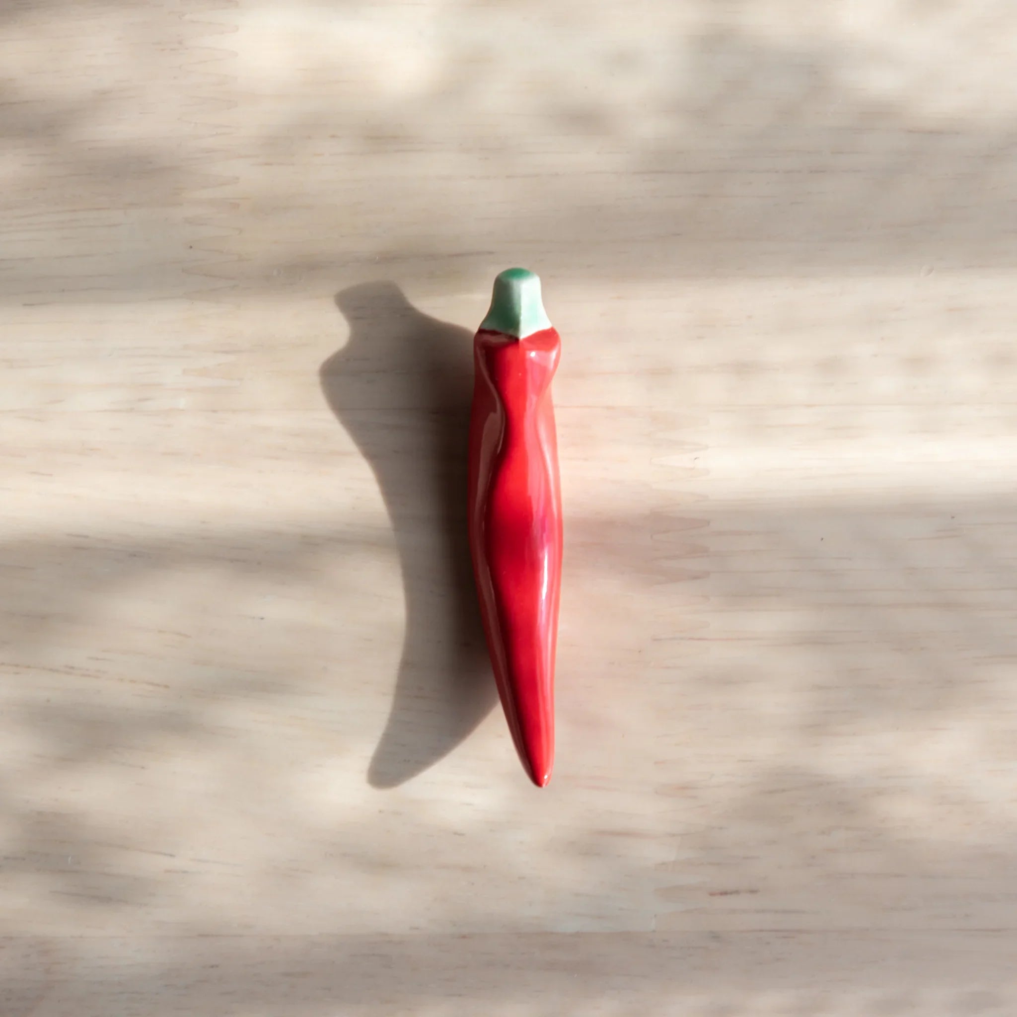 Pepper Handcrafted Pen Rest featuring red bell pepper ceramic design with handmade details and vegetable shape appeal