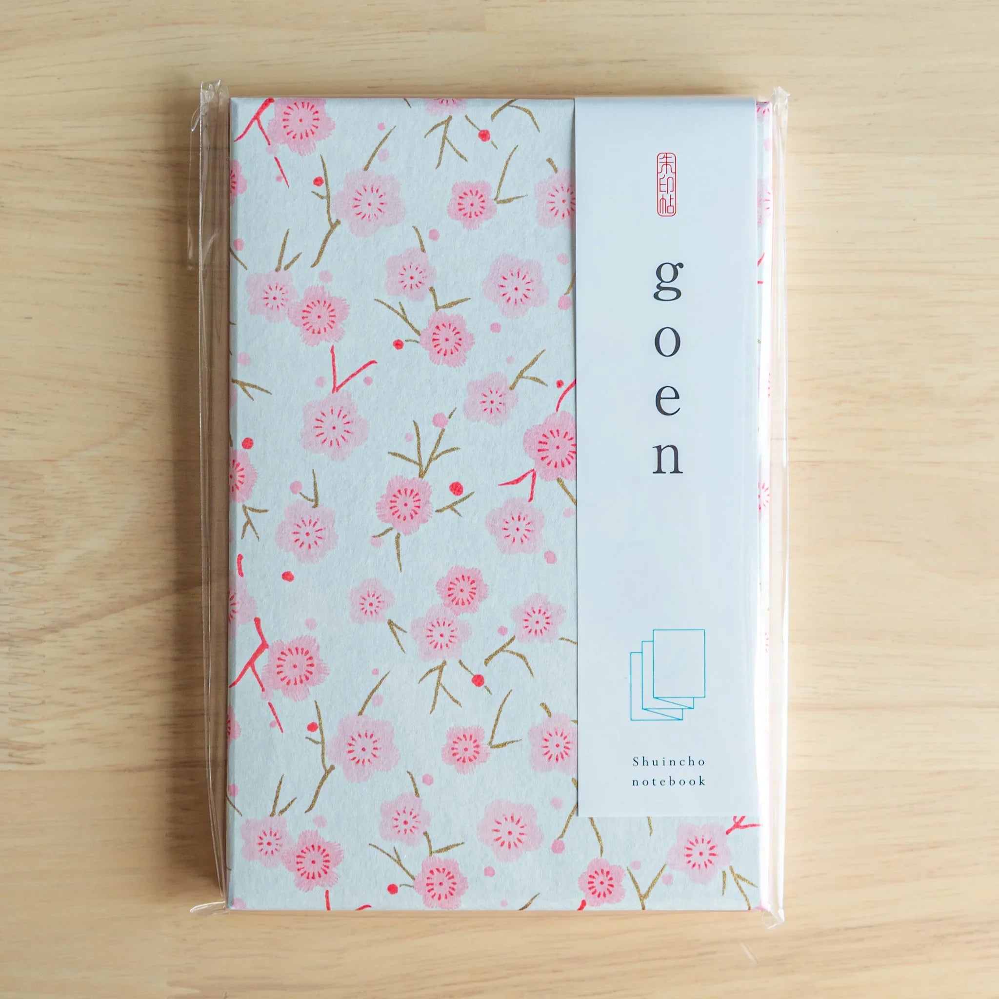 Pink Plum Blossoms washi goshuincho in original packaging with white goen belly band and Shuincho notebook label