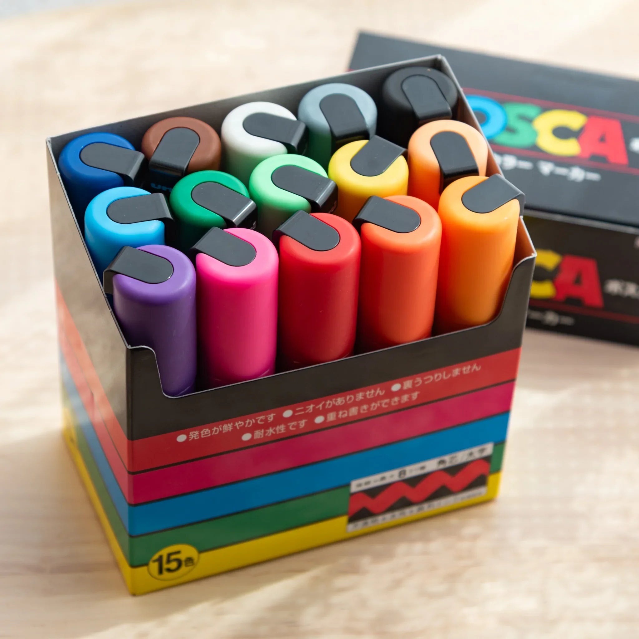 POSCA Markers Set (Bold Chisel Tip, 15 Colors) - paint marker showing side angle showing product depth and construction