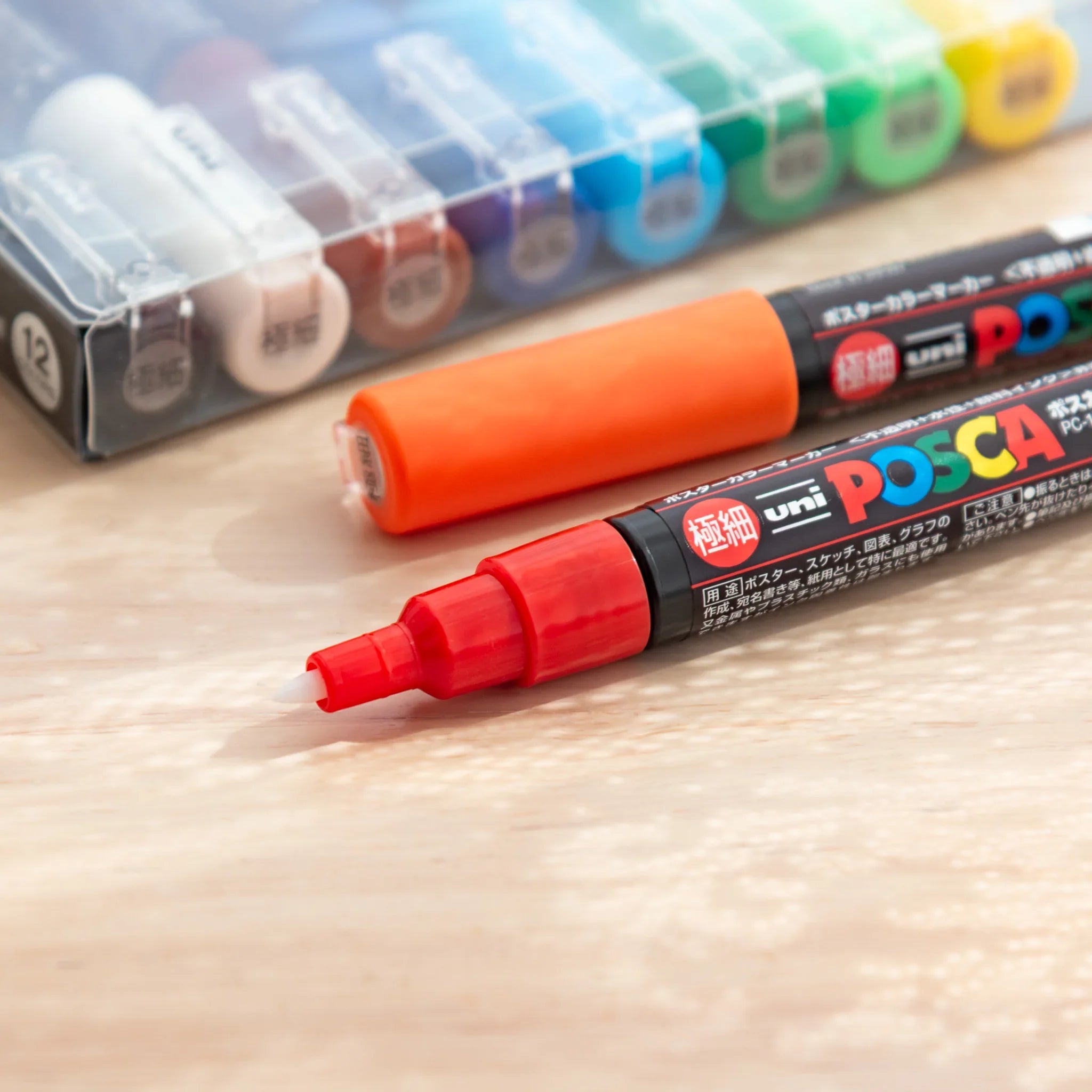 POSCA Markers Set (Extra Fine Tip, 12 Colors) - paint marker showing side angle showing product depth and construction