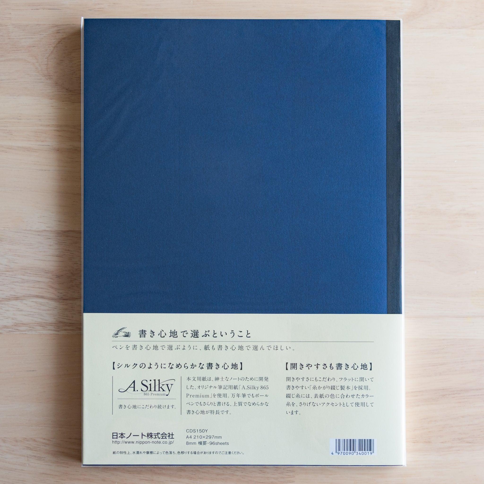 Back of blue Premium C.D. Japanese notebook with cream label explaining A.Silky 865 Premium paper.