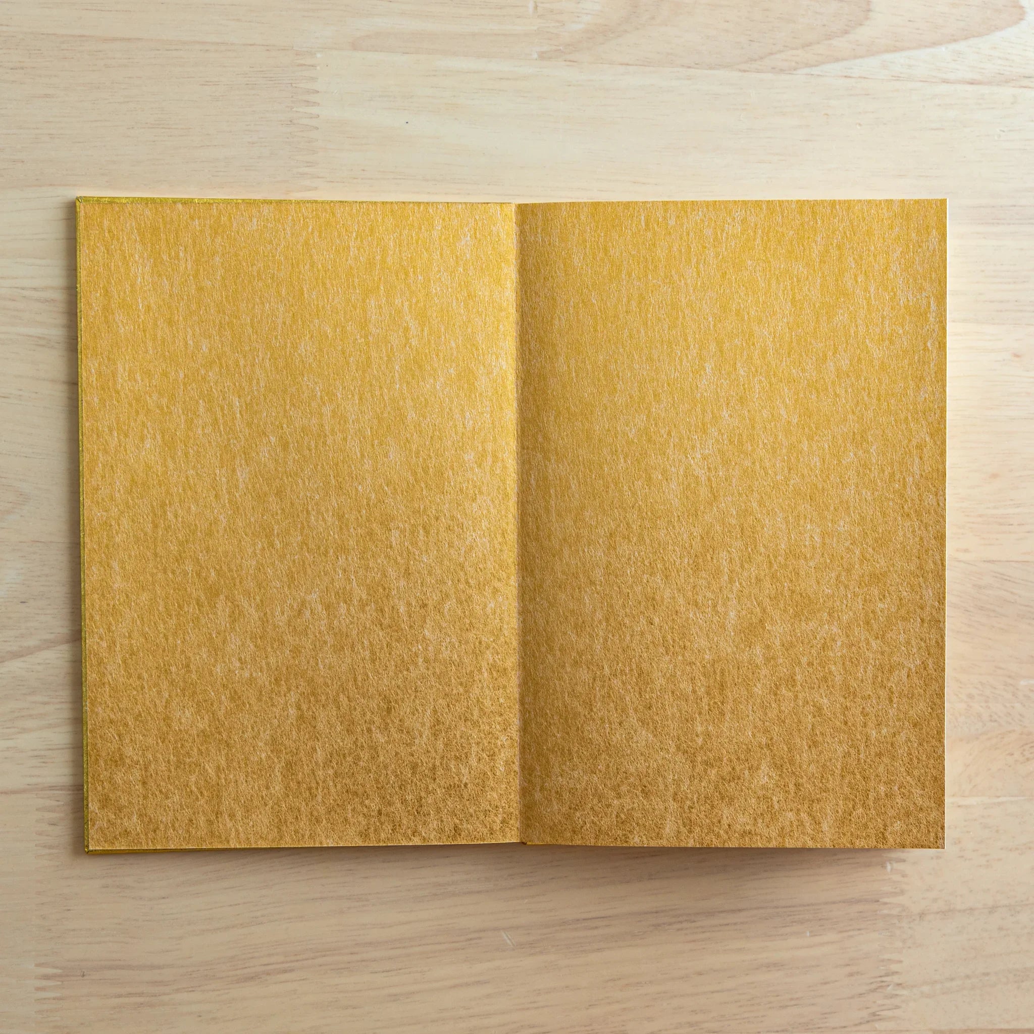Premium Gold washi goshuincho book with pages fanned showing interior page thickness showing width detail