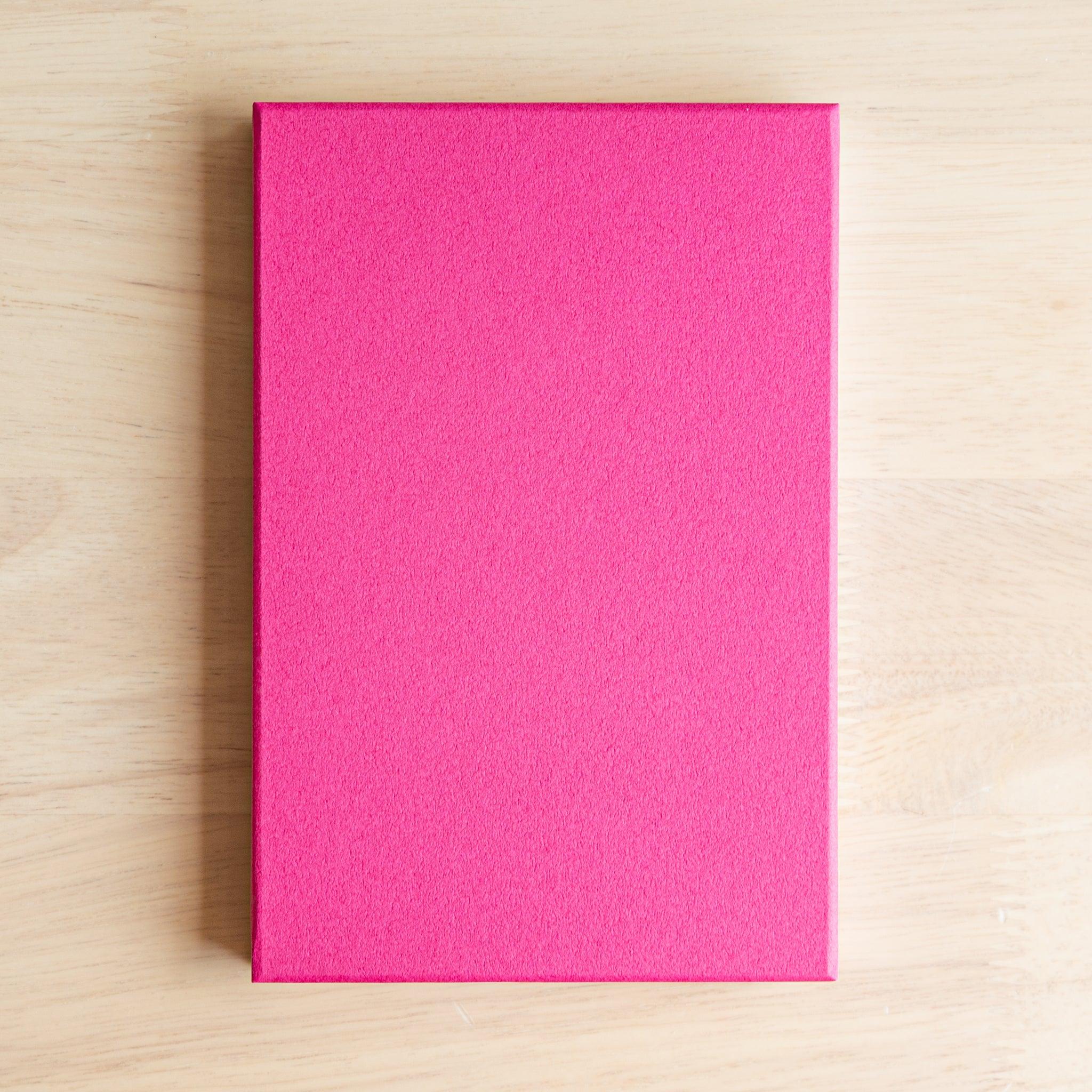 Back cover of bright pink Goshuinsho stamp book, vibrant and clean design for Japanese stamp collecting journeys.