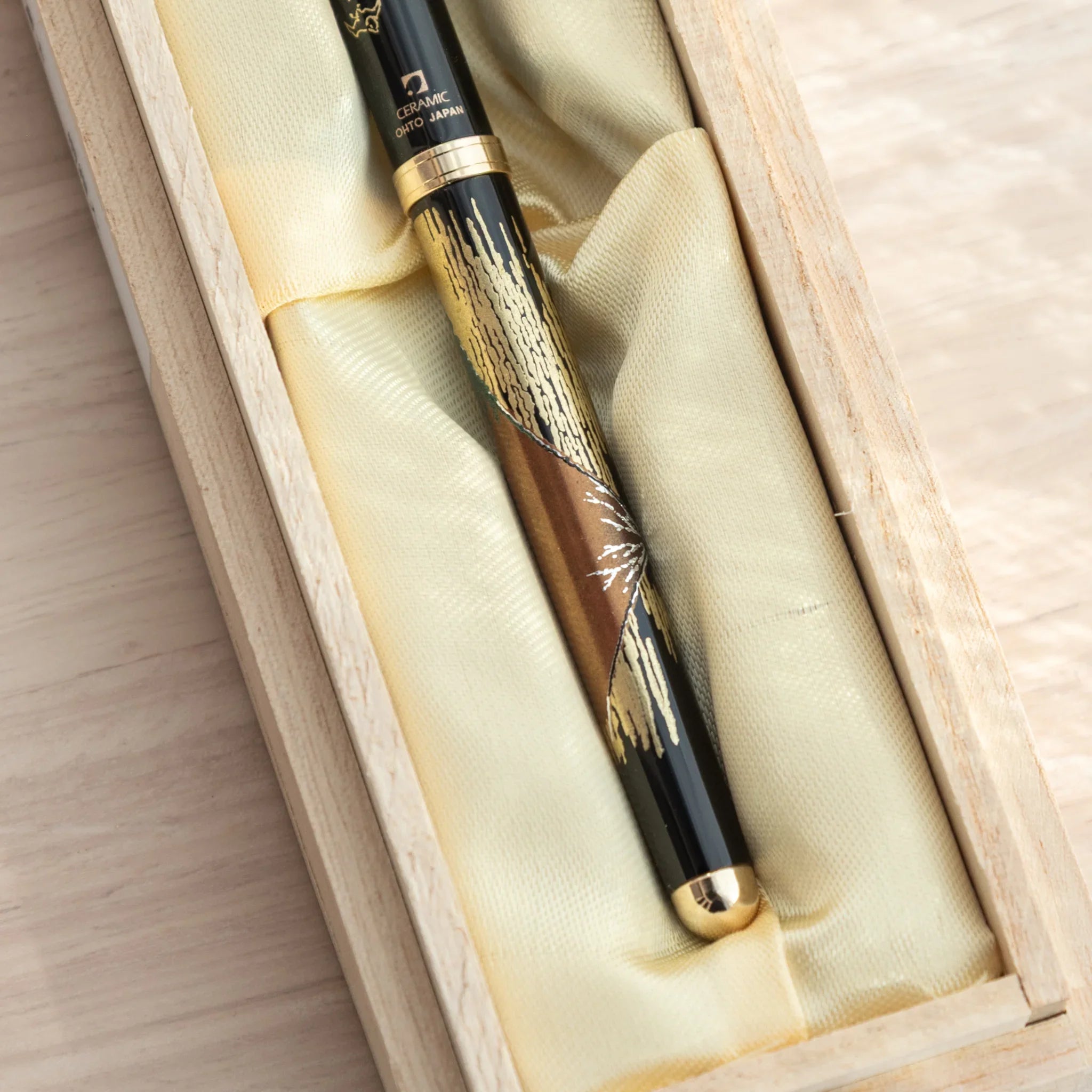 hand-made Yamanaka ballpoint pen features red fuji design in traditional lacquer craft for writing