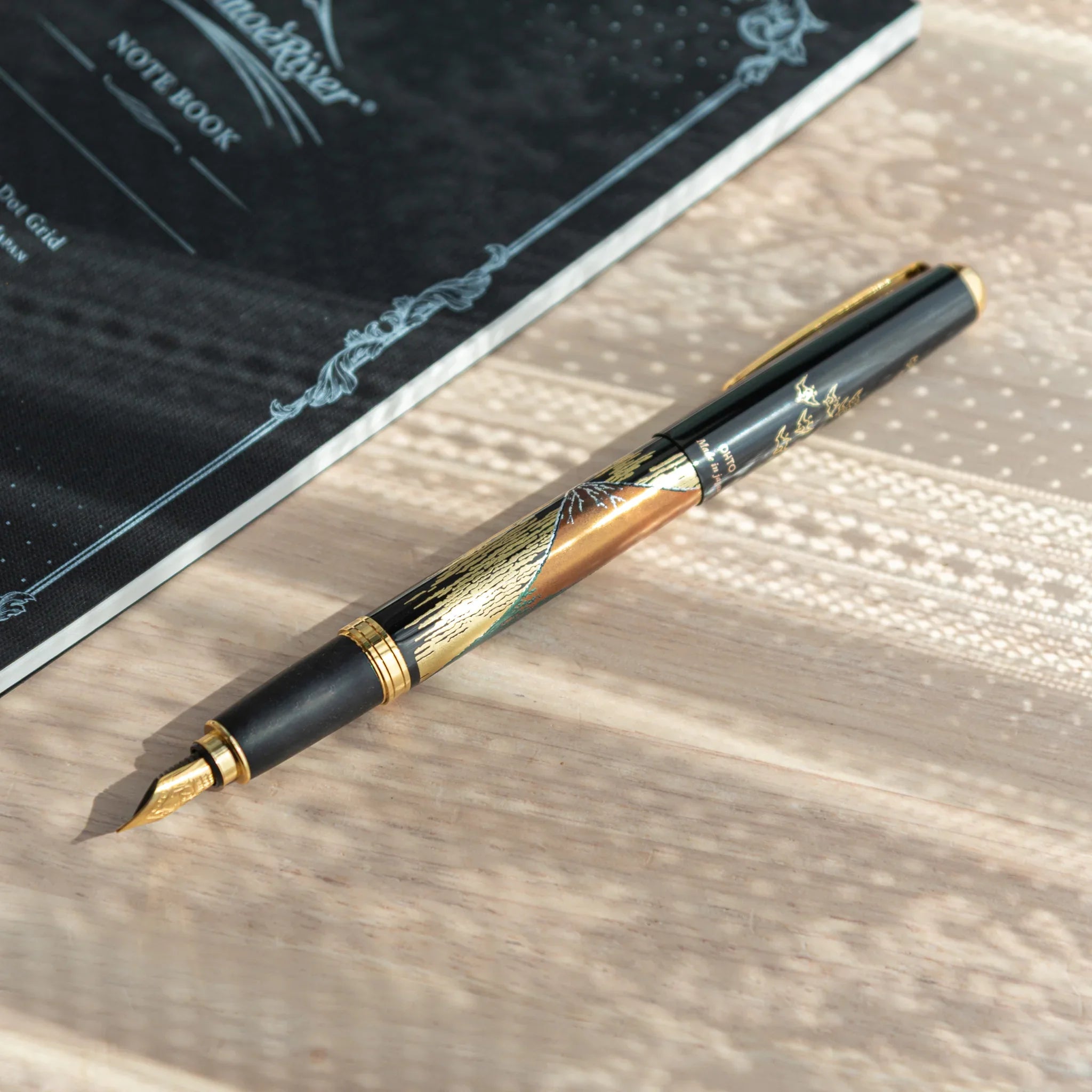 Red Fuji Yamanaka Fountain Pen, image 6: three-quarter view of complete item presenting visual clarity