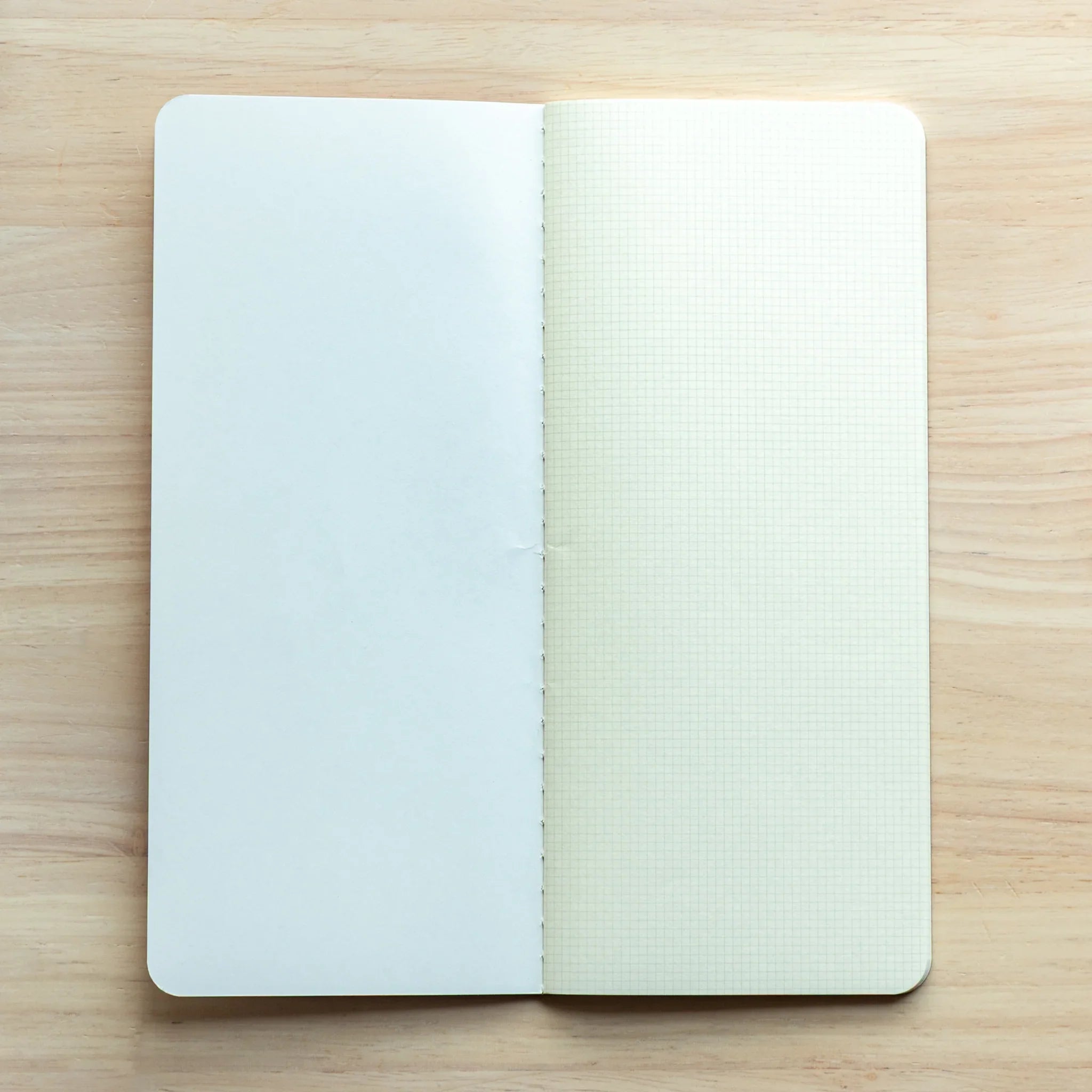 RO-BIKI Basic Series 2mm grid notebook displayed flat showing cover detail and grid pattern, quality Japanese stationery