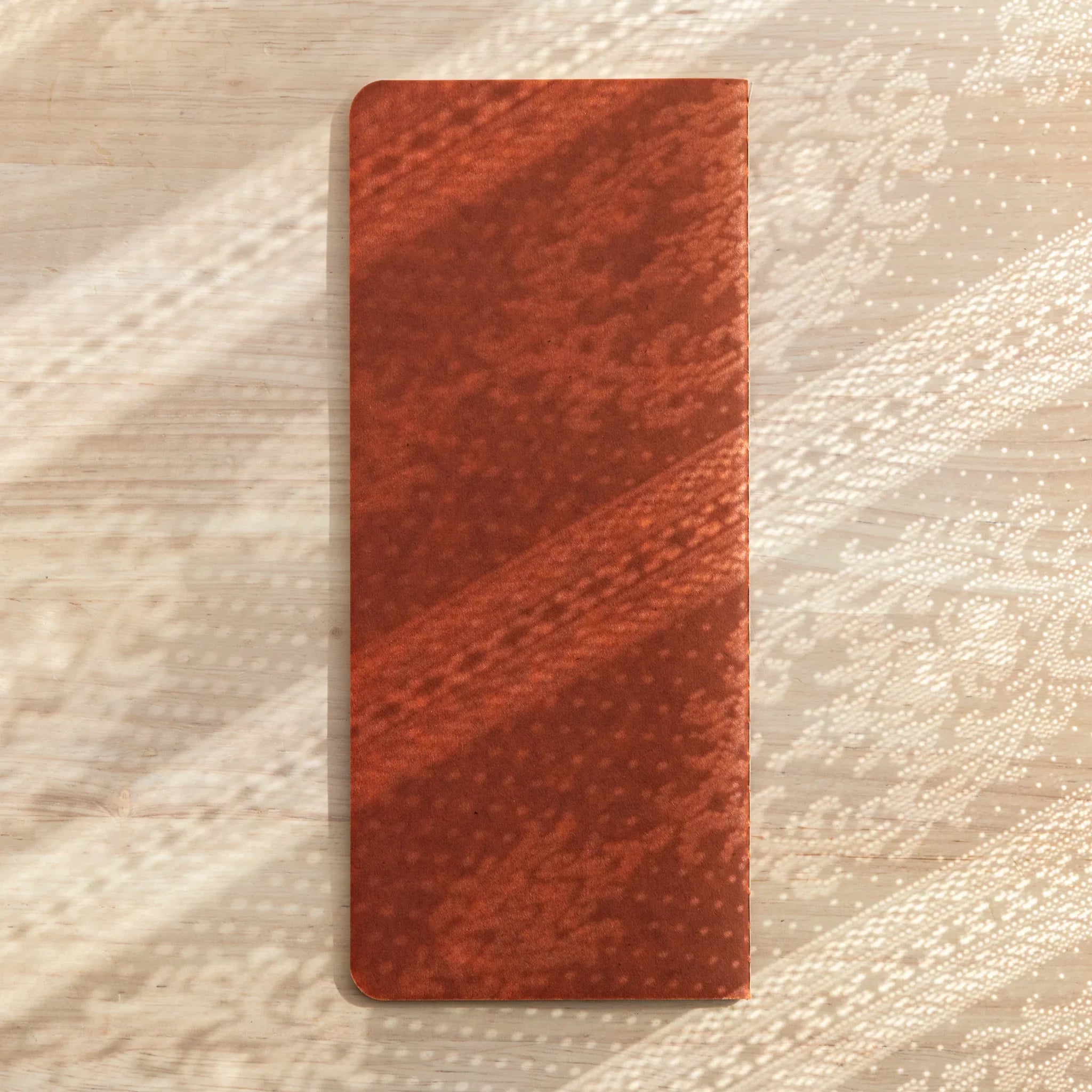 RO-BIKI Basic notebook featuring 2mm grid ruling displayed flat showing cover and interior detail, quality Japanese pad