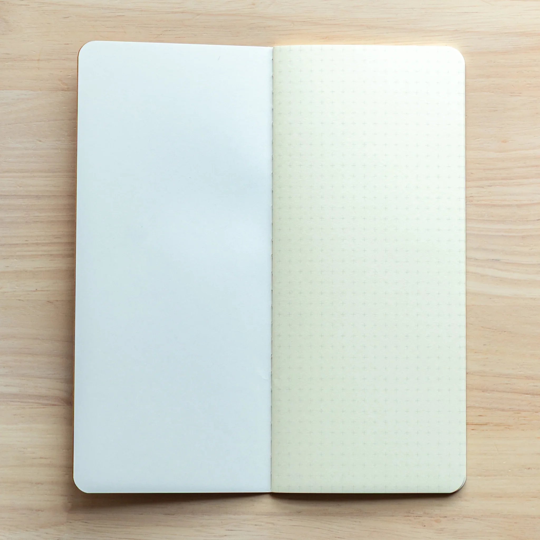 RO-BIKI Basic notebook featuring 5mm reticle grid pattern shown flat on surface, displaying cover and interior detail