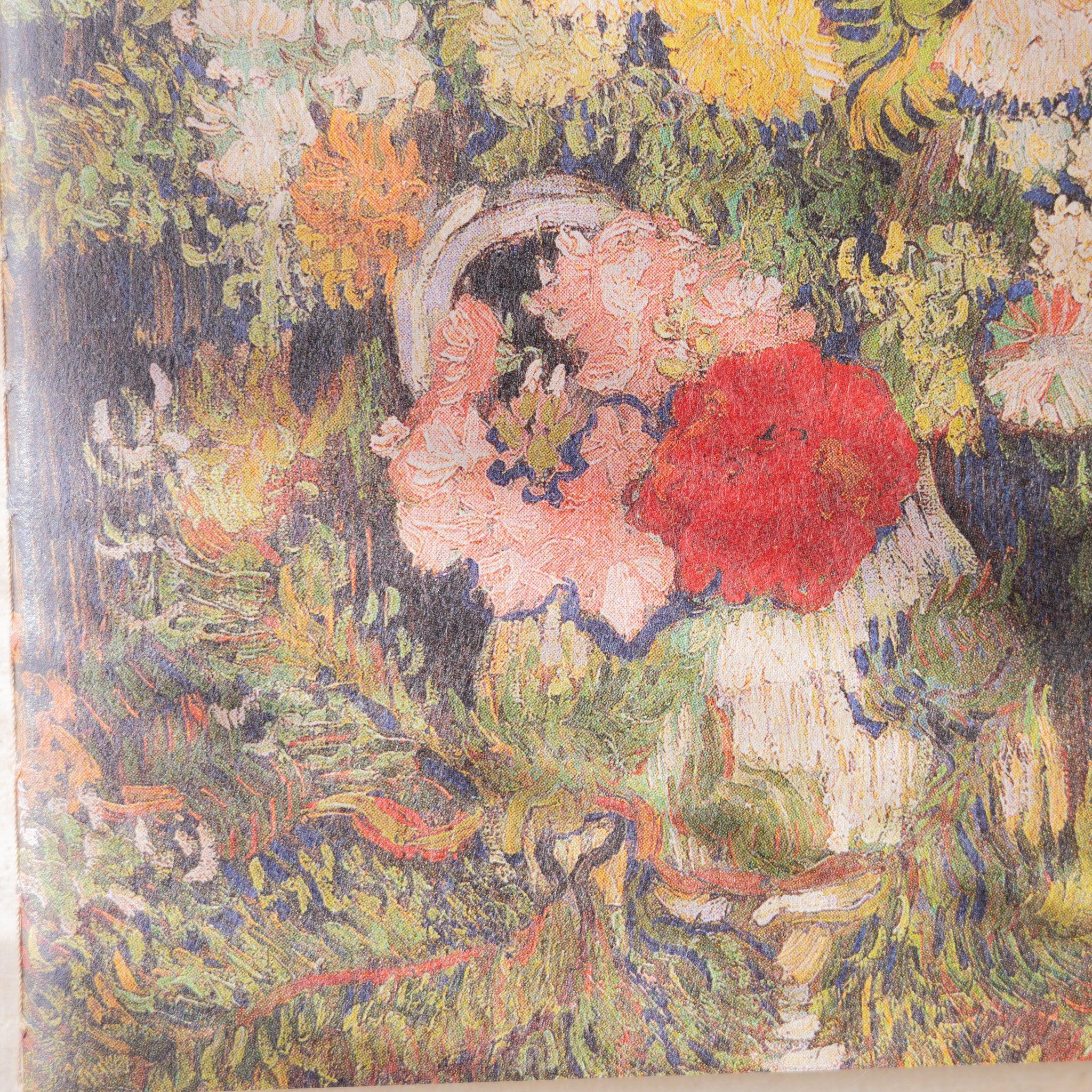 Close-up of RO-BIKI NOTE waxed cover showing red, pink, and white flowers from the floral bouquet painting print