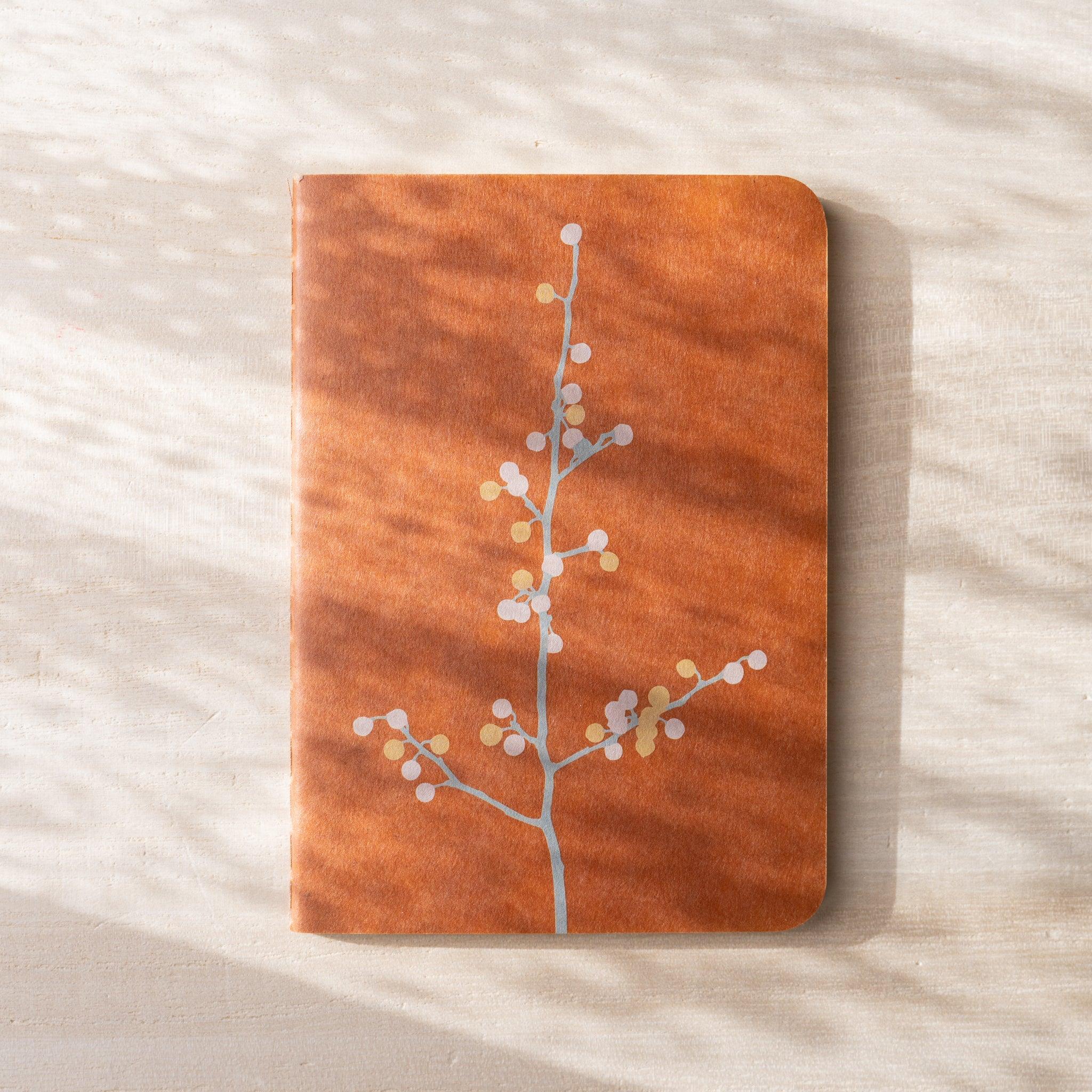 RO-BIKI NOTE Japanese notebook, full terracotta waxed kraft cover with branch and berry dot illustration in silver and gold