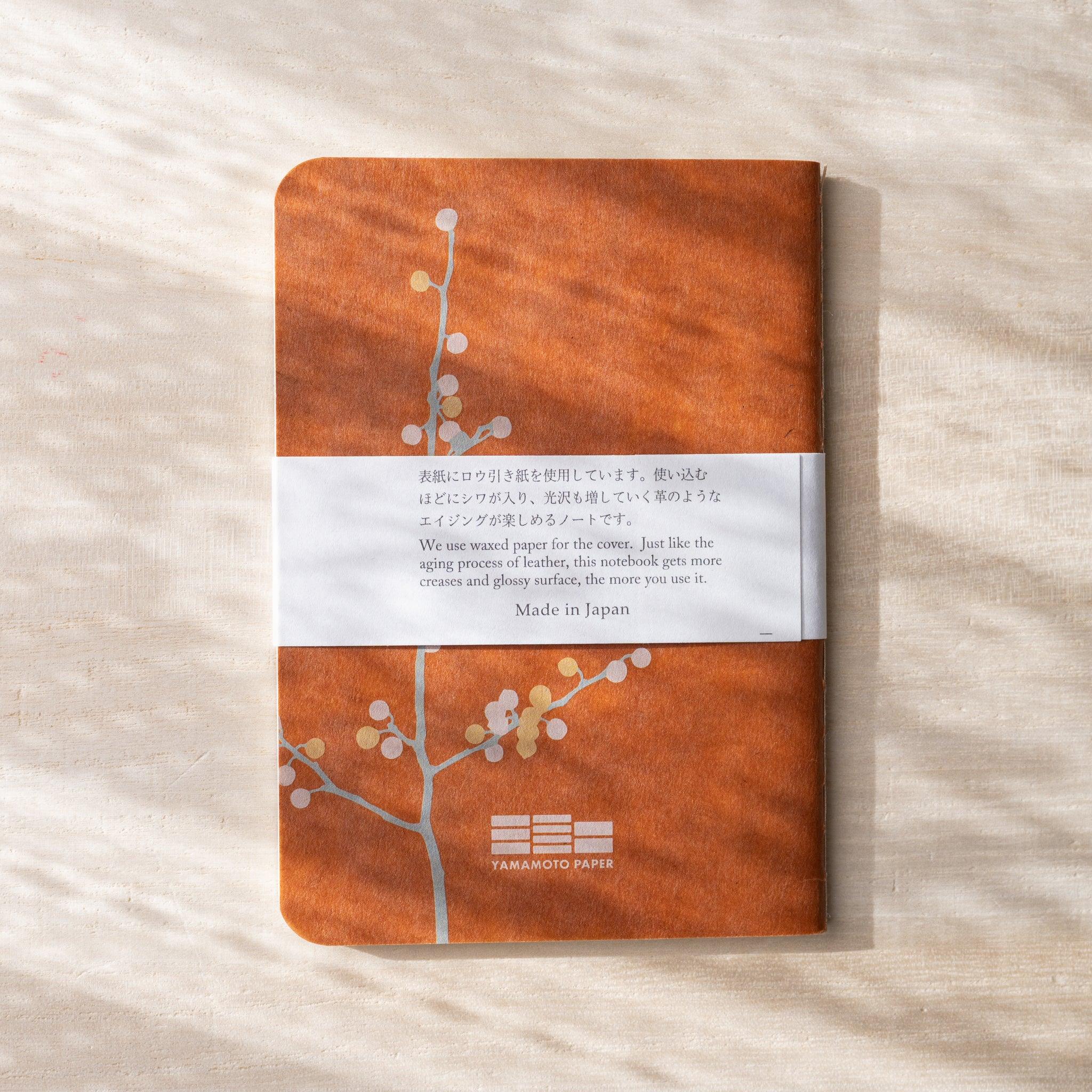 RO-BIKI NOTE back cover with branch and flower design, Yamamoto Paper logo, rounded corners and spine