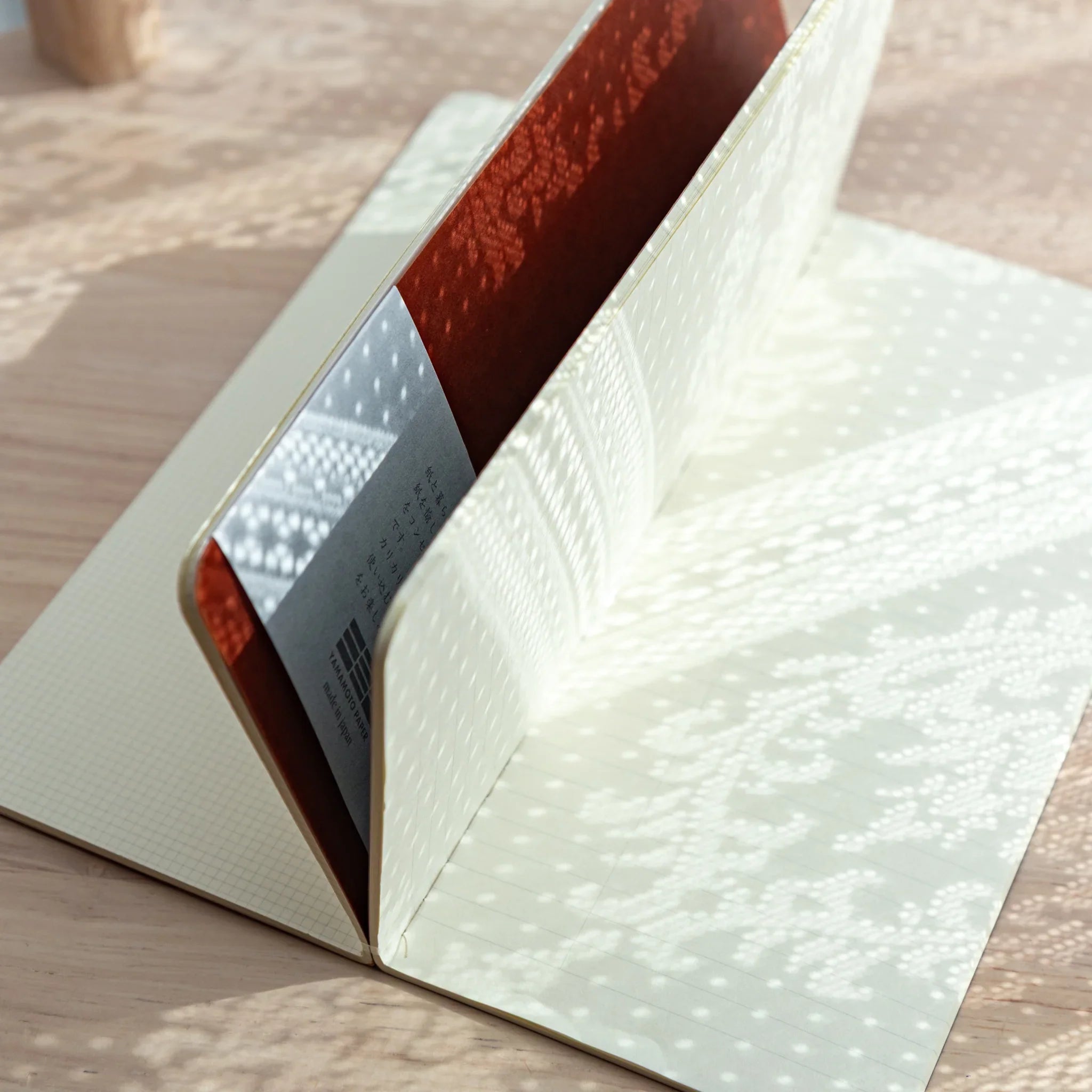 RO-BIKI Japanese Note Book inside Cool Gray canvas cover, showing interior pocket holding card securely.