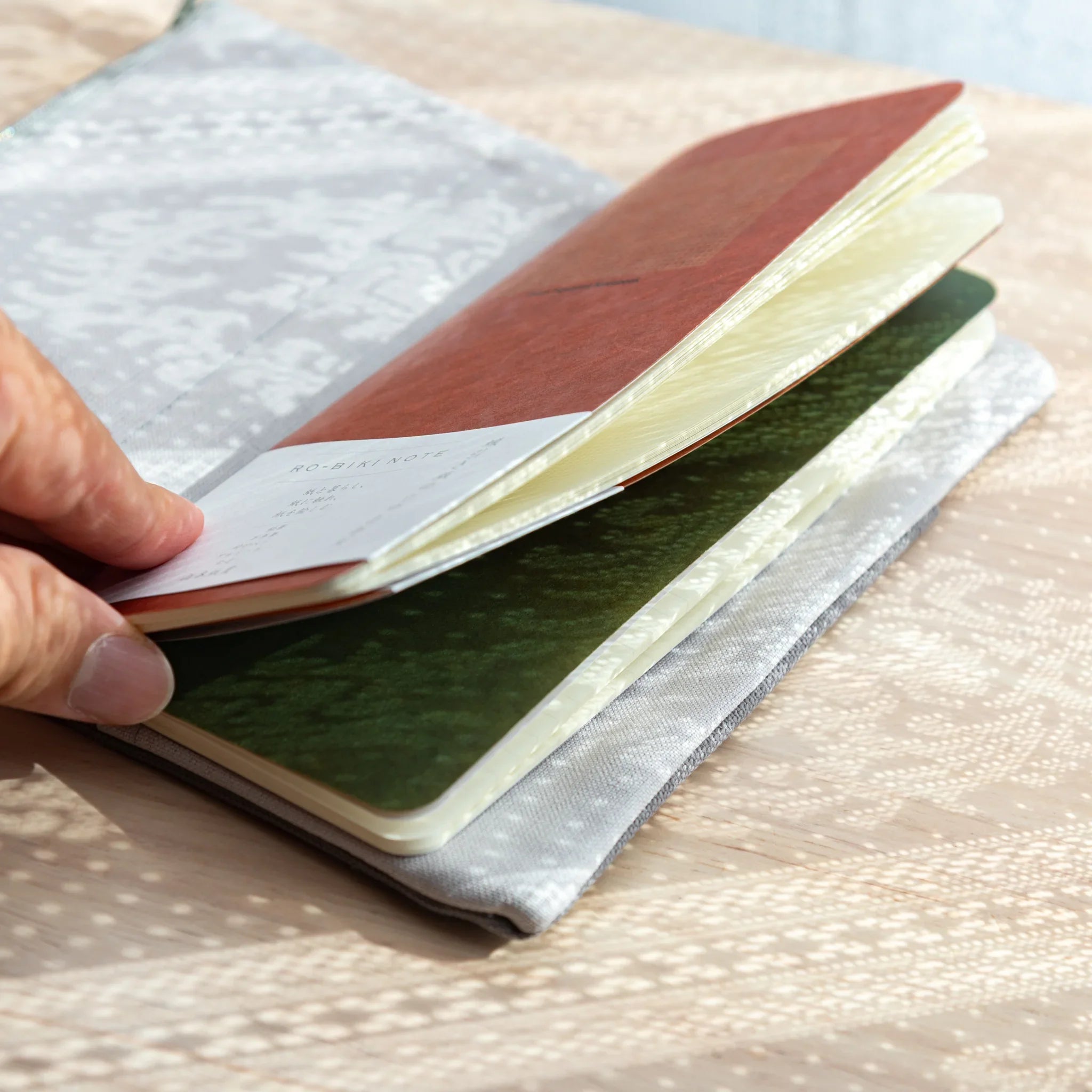 RO-BIKI Canvas Cover in cool gray showing front with pocket detail, quality canvas organization accessory