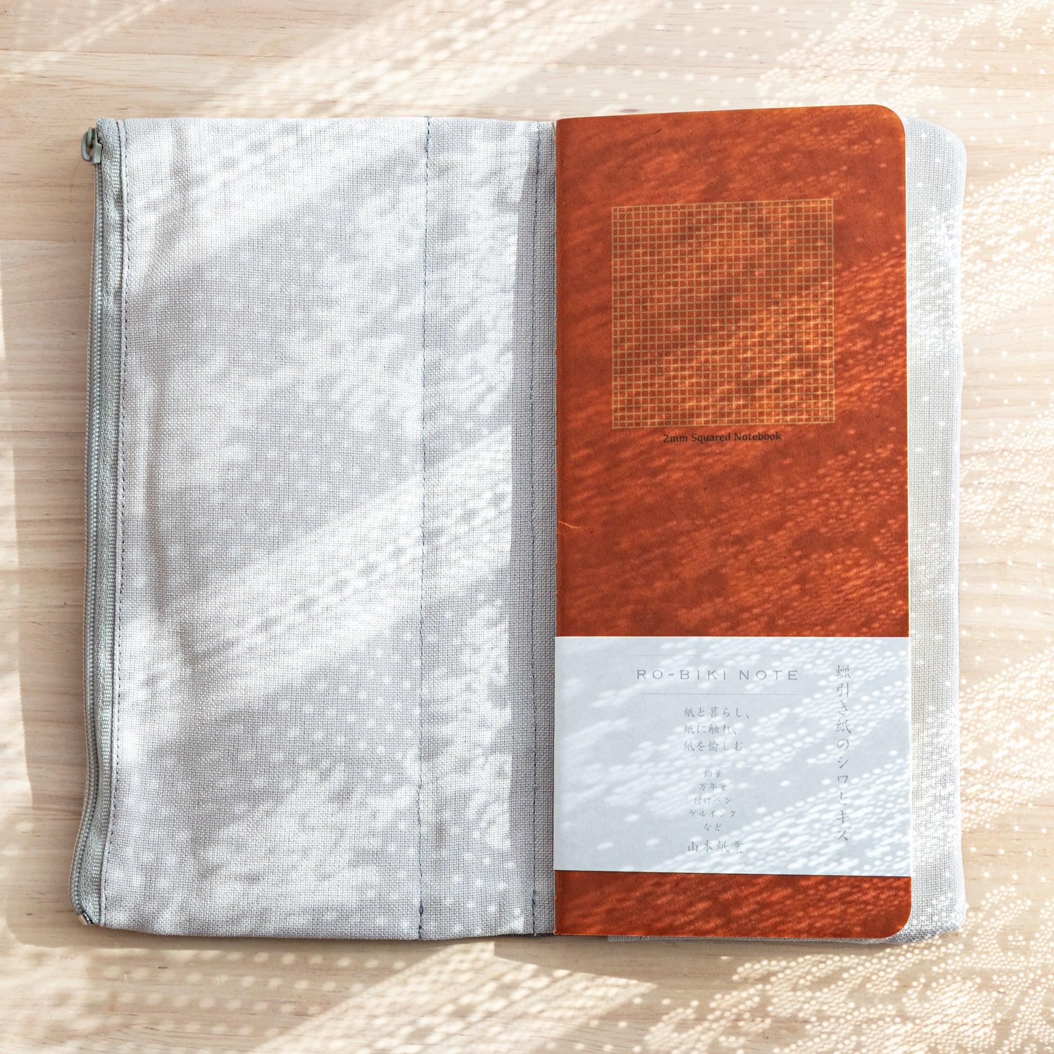 RO-BIKI Canvas Cover Cool Gray with Japanese Note Book inside, slim design with stationery pocket shown open.