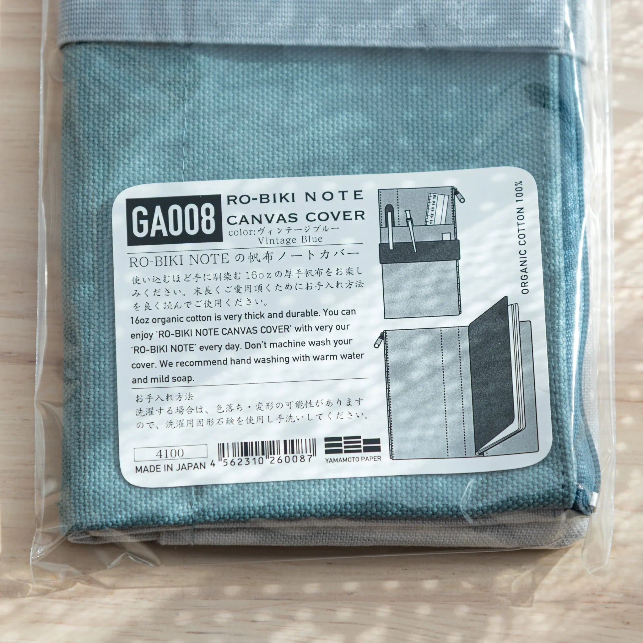 RO-BIKI Canvas Cover vintage blue displayed showing integrated pocket design, canvas organizer for stationery