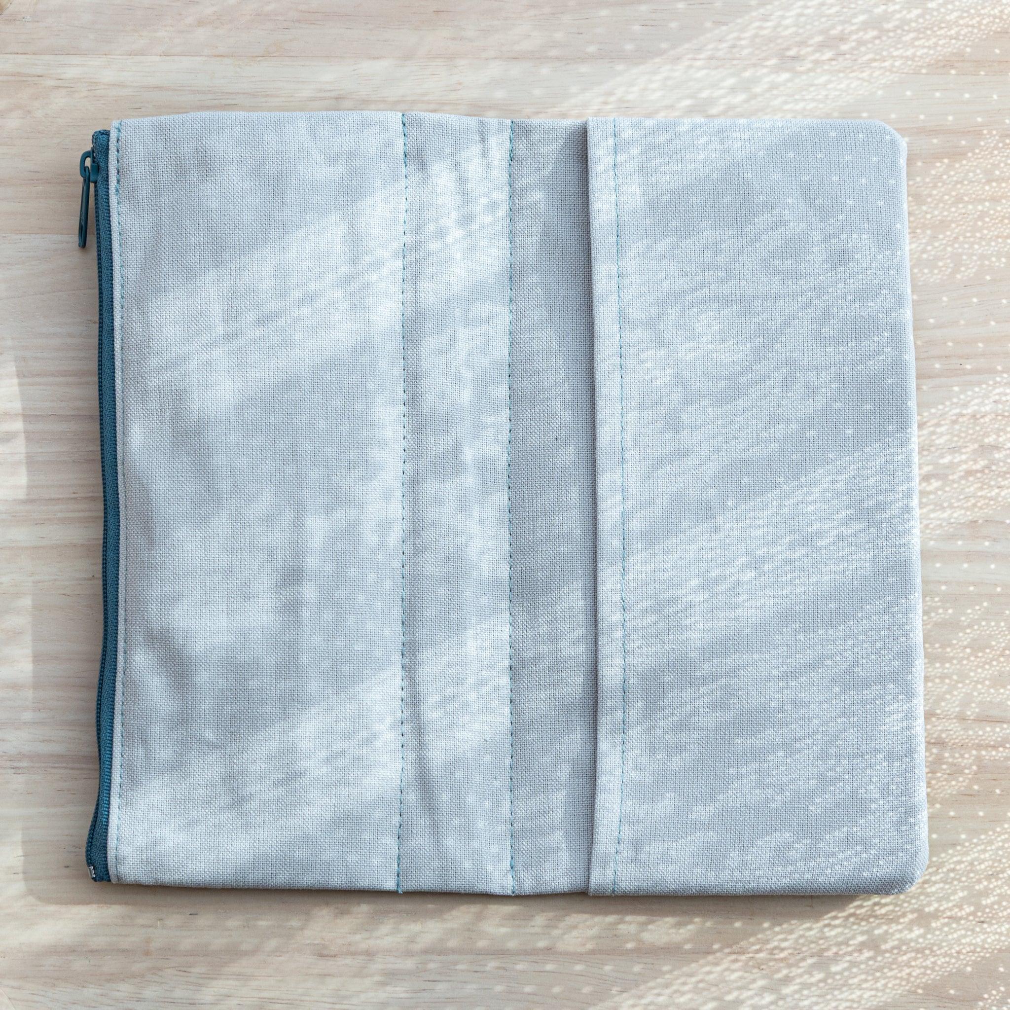 RO-BIKI Canvas Cover in vintage blue displayed showing front design with stationery pocket, Japanese quality organizer