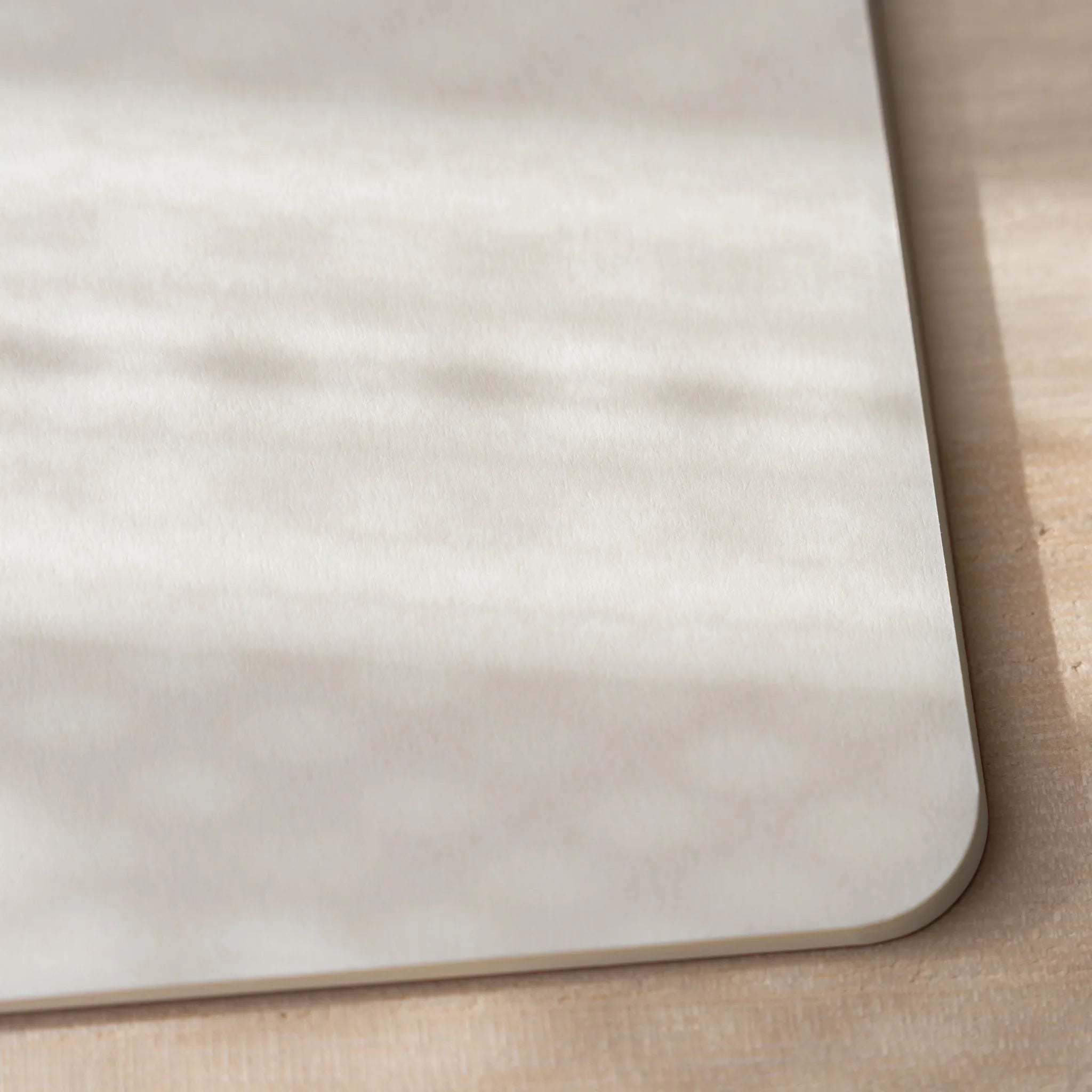 RO-BIKI NOTE Edocha Brown notebook back cover close-up showing smooth cream cardstock with rounded corners