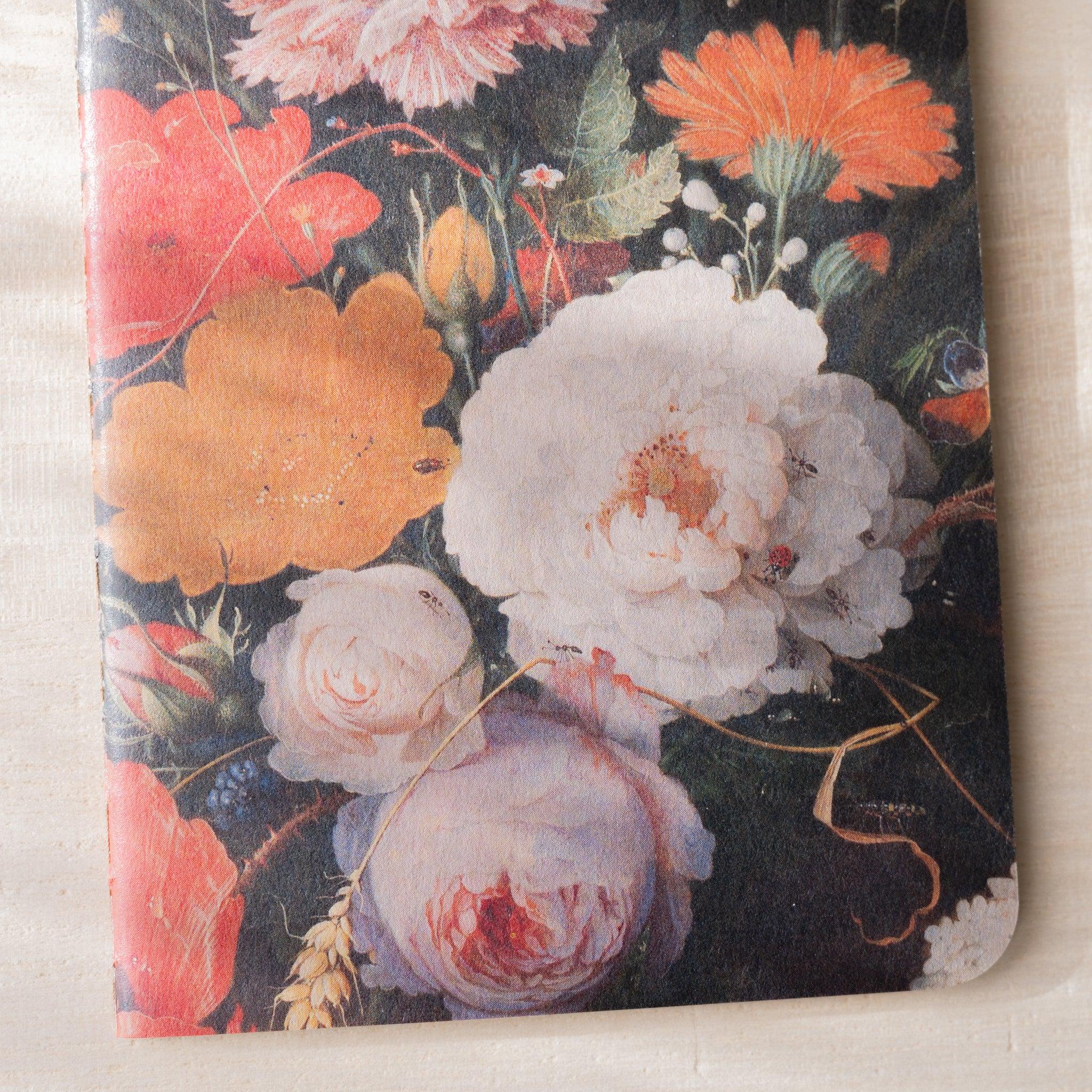 RO-BIKI NOTE Japanese notebook, waxed cover close-up, white roses and orange flowers Dutch floral painting, rounded corner