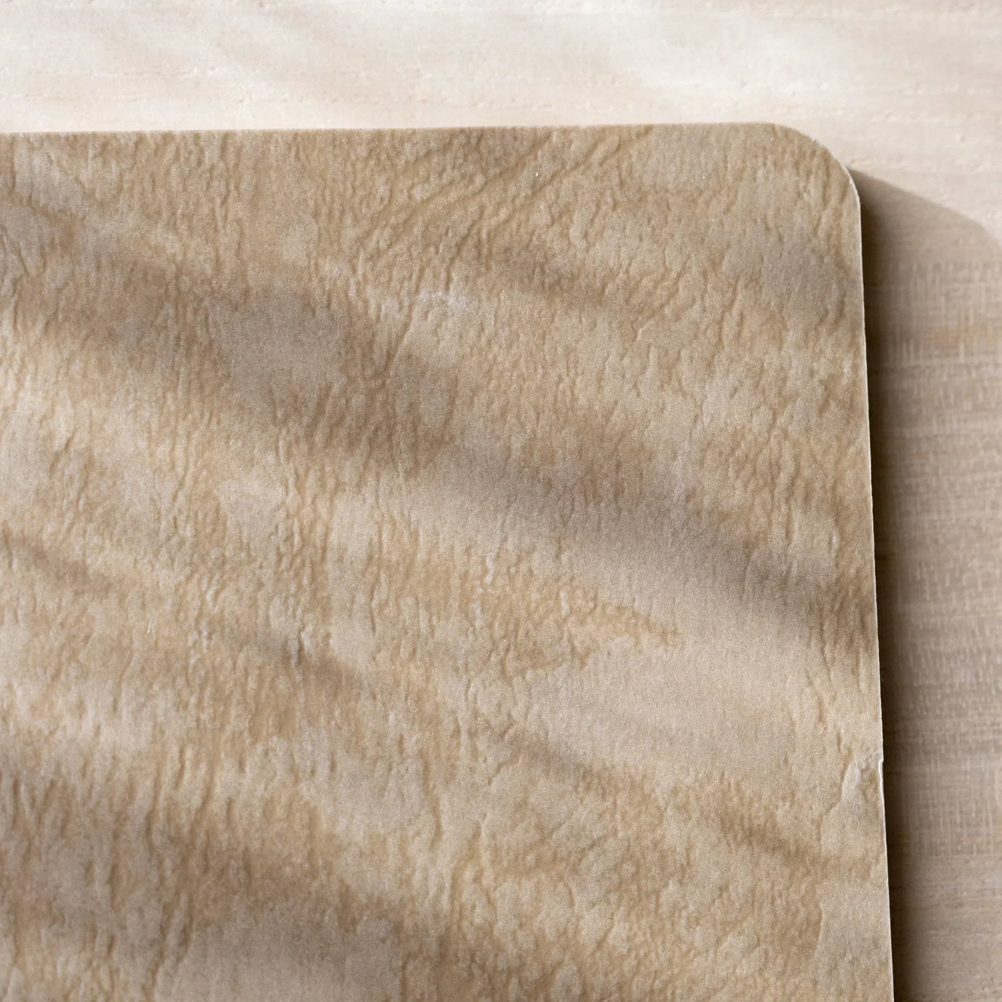 RO-BIKI NOTE open flat, blank white page on left, blank cream page on right, rounded corners and spine