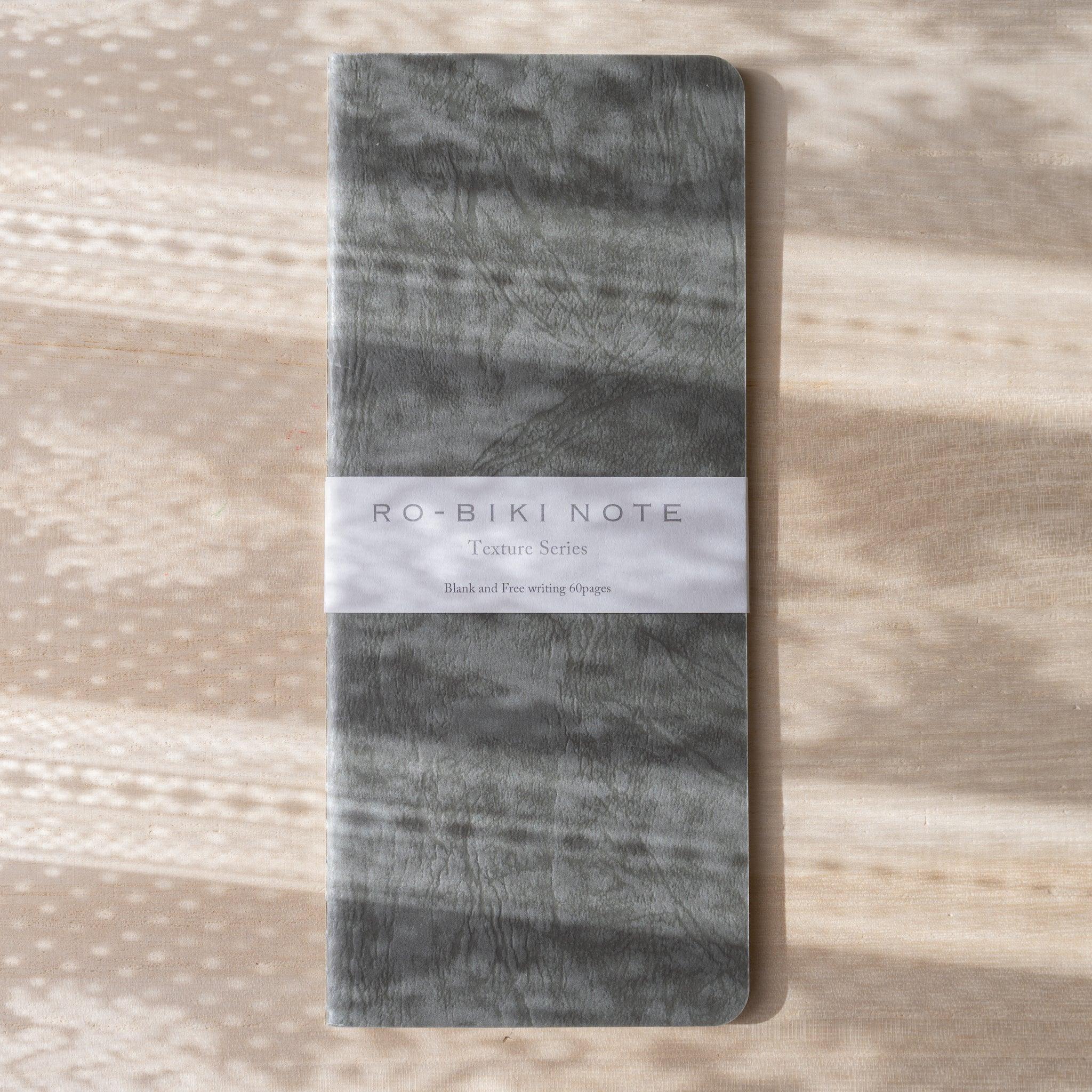 RO-BIKI NOTE Texture Series Ginnezu gray wax-coated notebook front cover with band label by Yamamoto Paper Japan