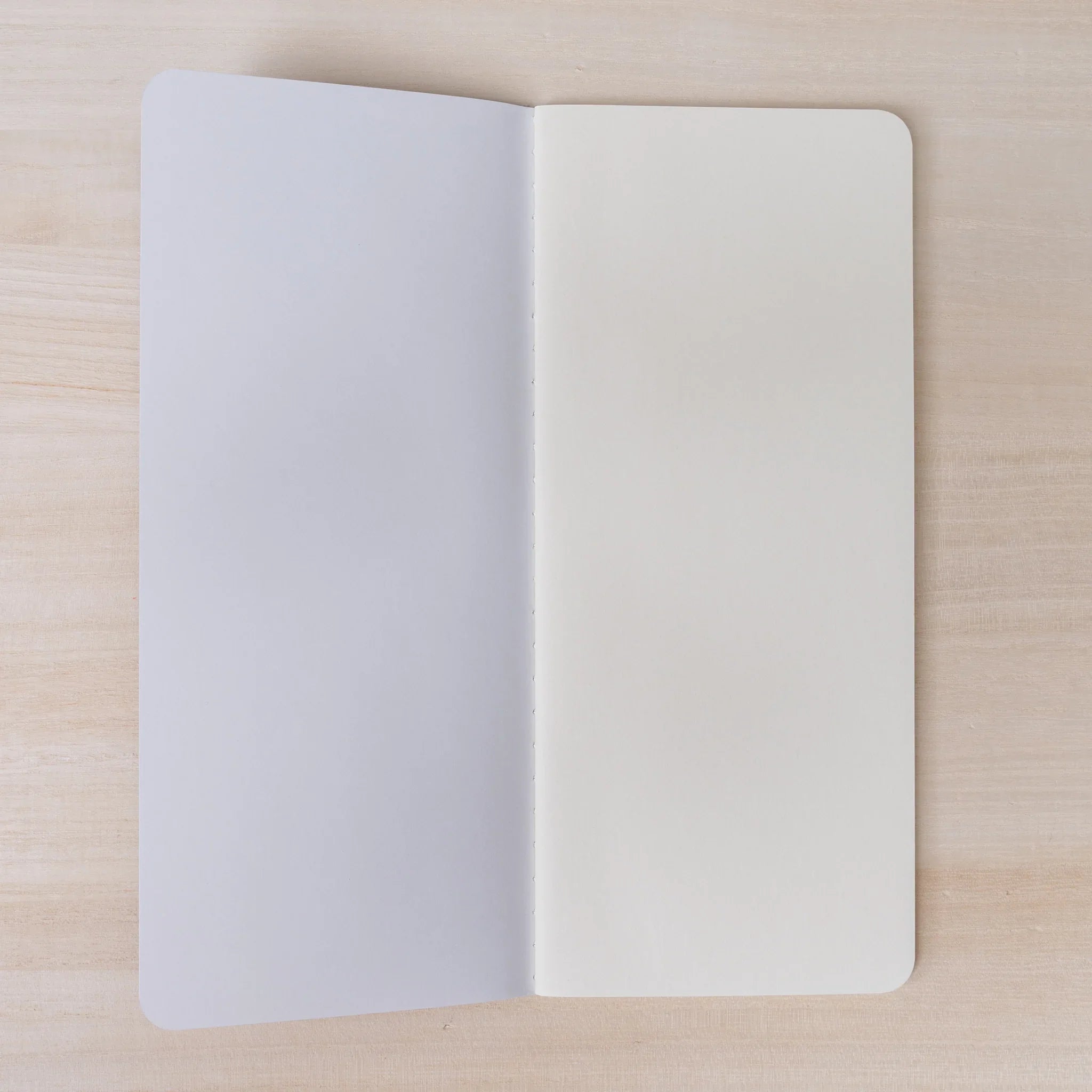 RO-BIKI NOTE Ginnezu gray notebook opened to blank cream Solist paper pages for fountain pen writing