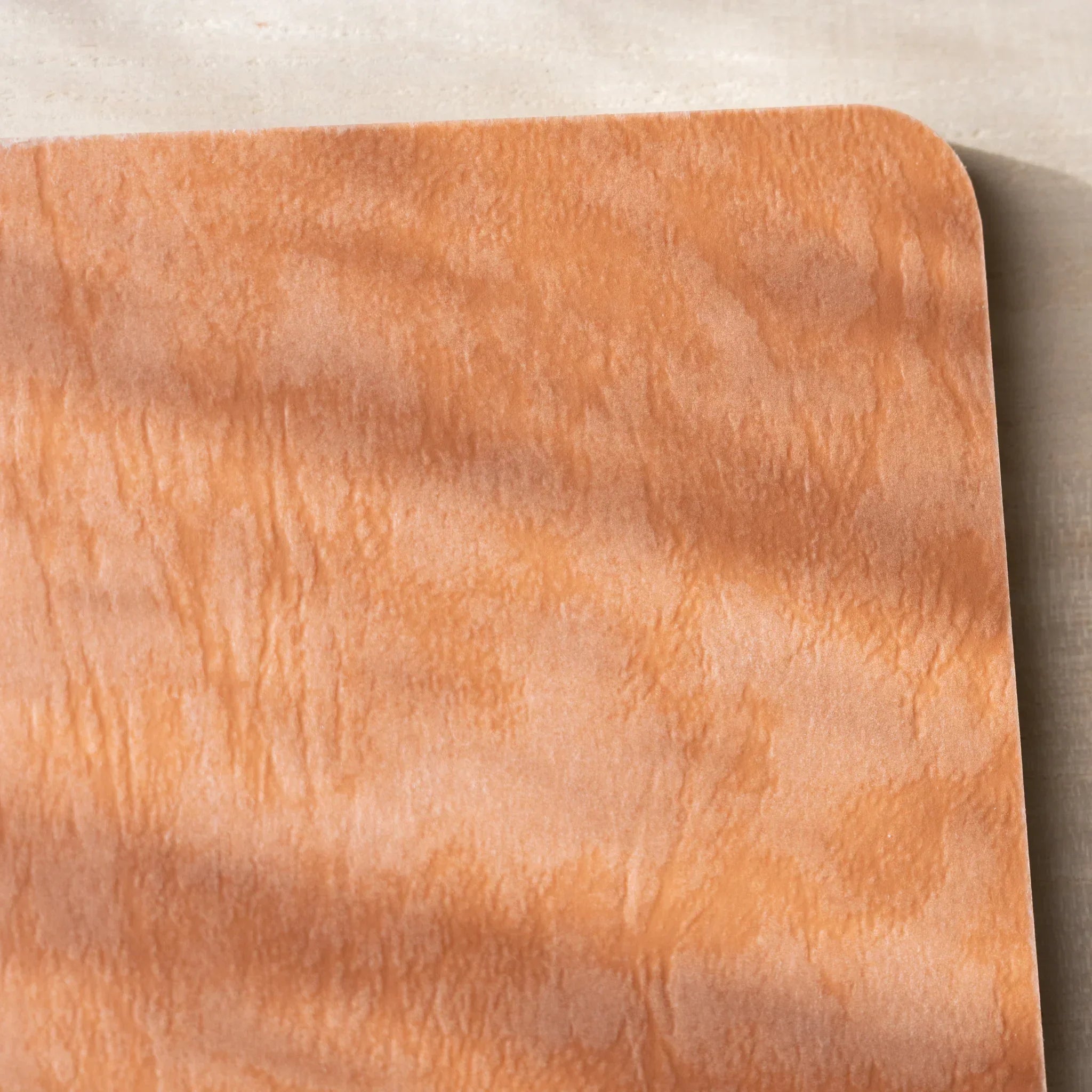 RO-BIKI NOTE open flat, blank white page on left, blank cream page on right, rounded corners and spine