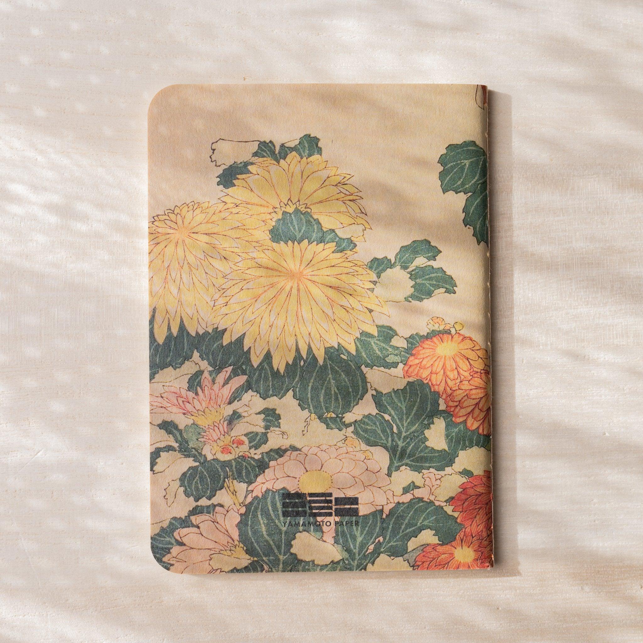 RO-BIKI NOTE back cover with chrysanthemum painting, yellow and orange flowers, YAMAMOTO PAPER logo, no belly band