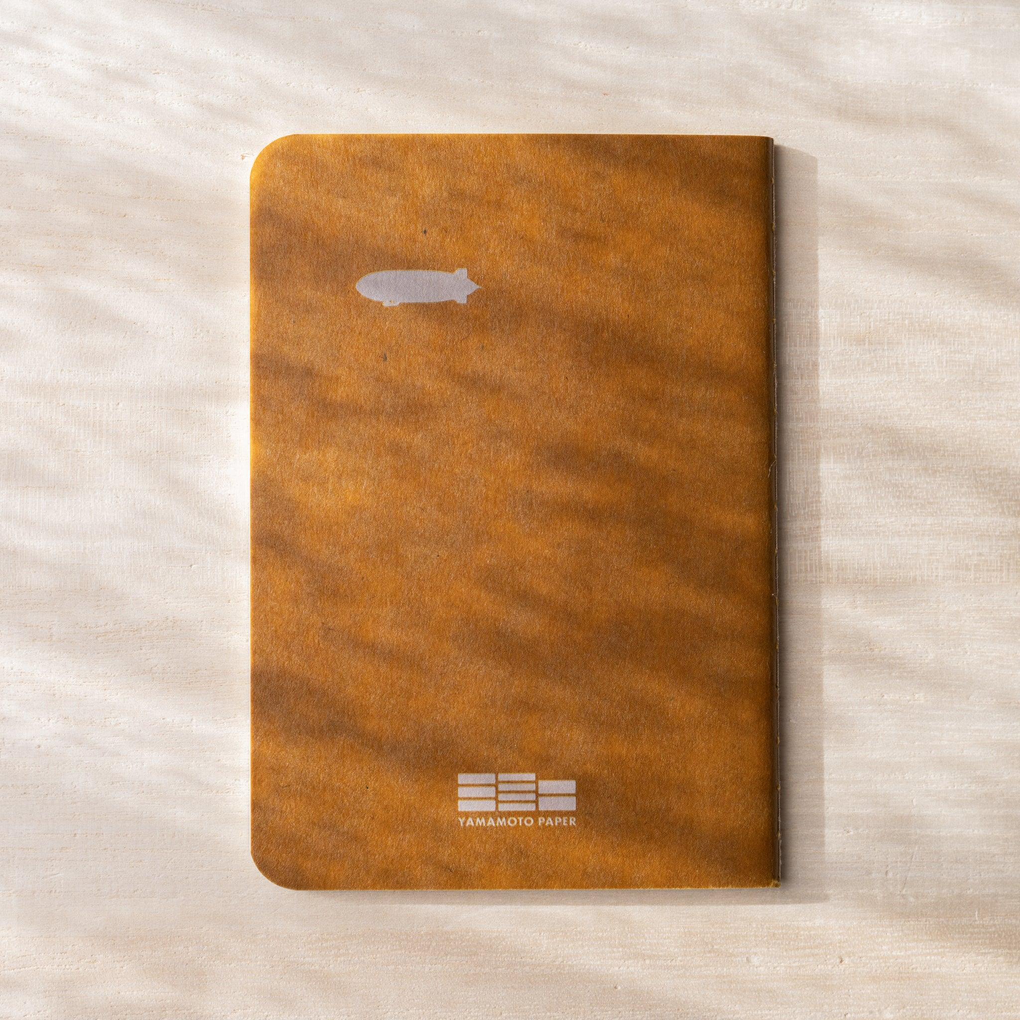 RO-BIKI Lighthouse Notebook, image_11_position_10: overhead shot showing full product view with visual clarity