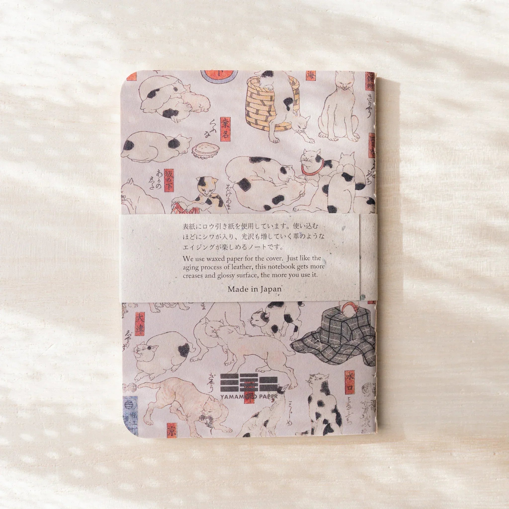RO-BIKI NOTE back cover with cat woodblock print, paper belly band showing Japanese and English text and Made in Japan label