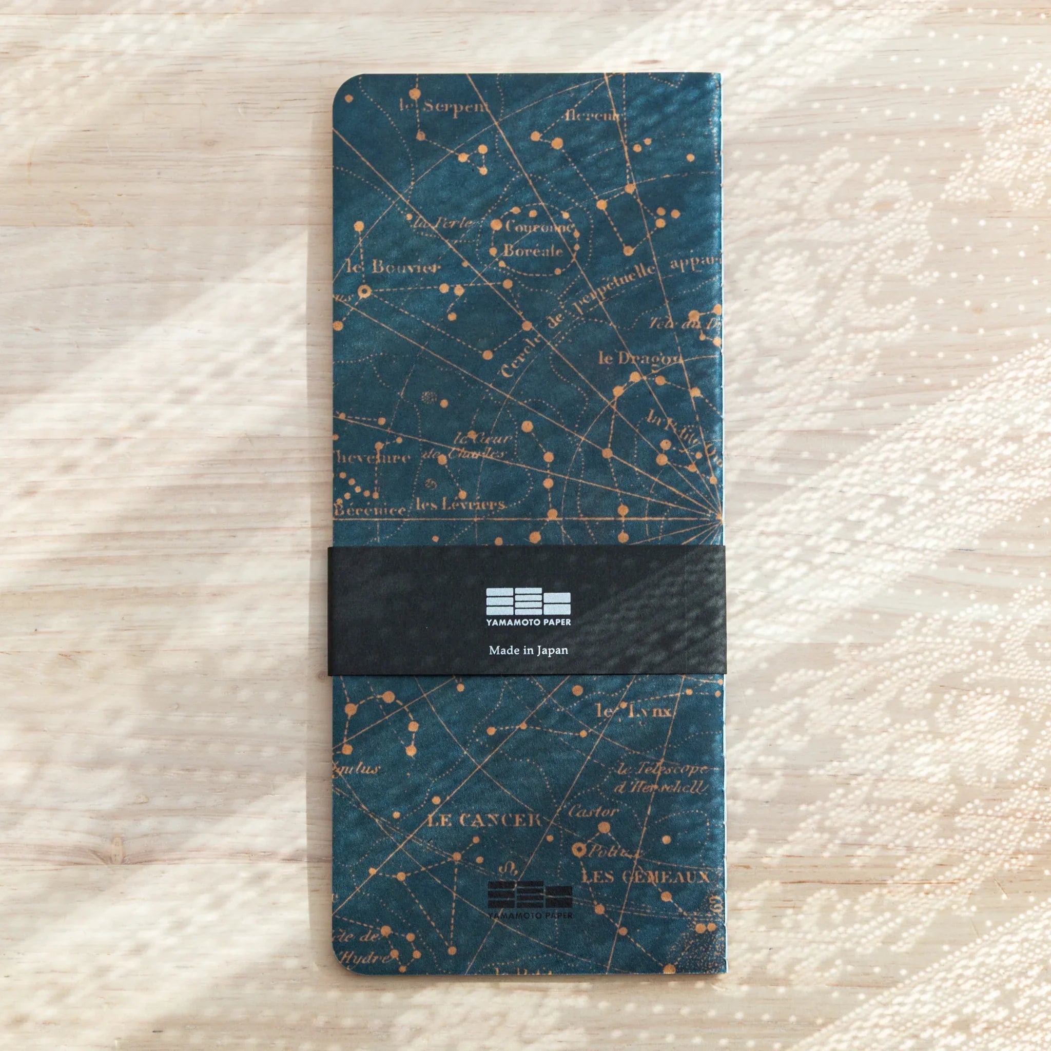 Spine detail of Japanese Notebook RO-BIKI Star Map, sturdy binding for durability.