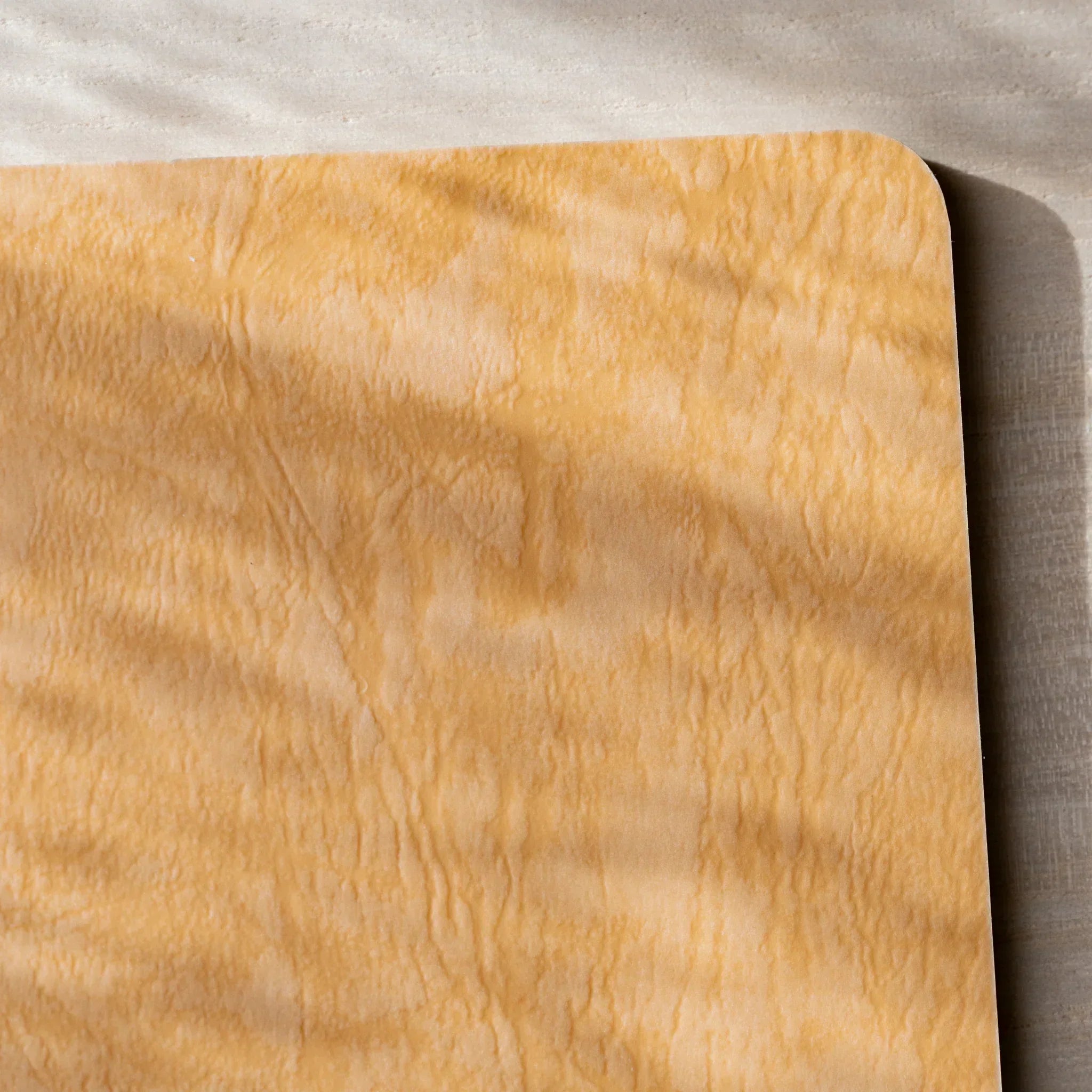 RO-BIKI NOTE open flat, blank white page on left, blank cream page on right, rounded corners and spine