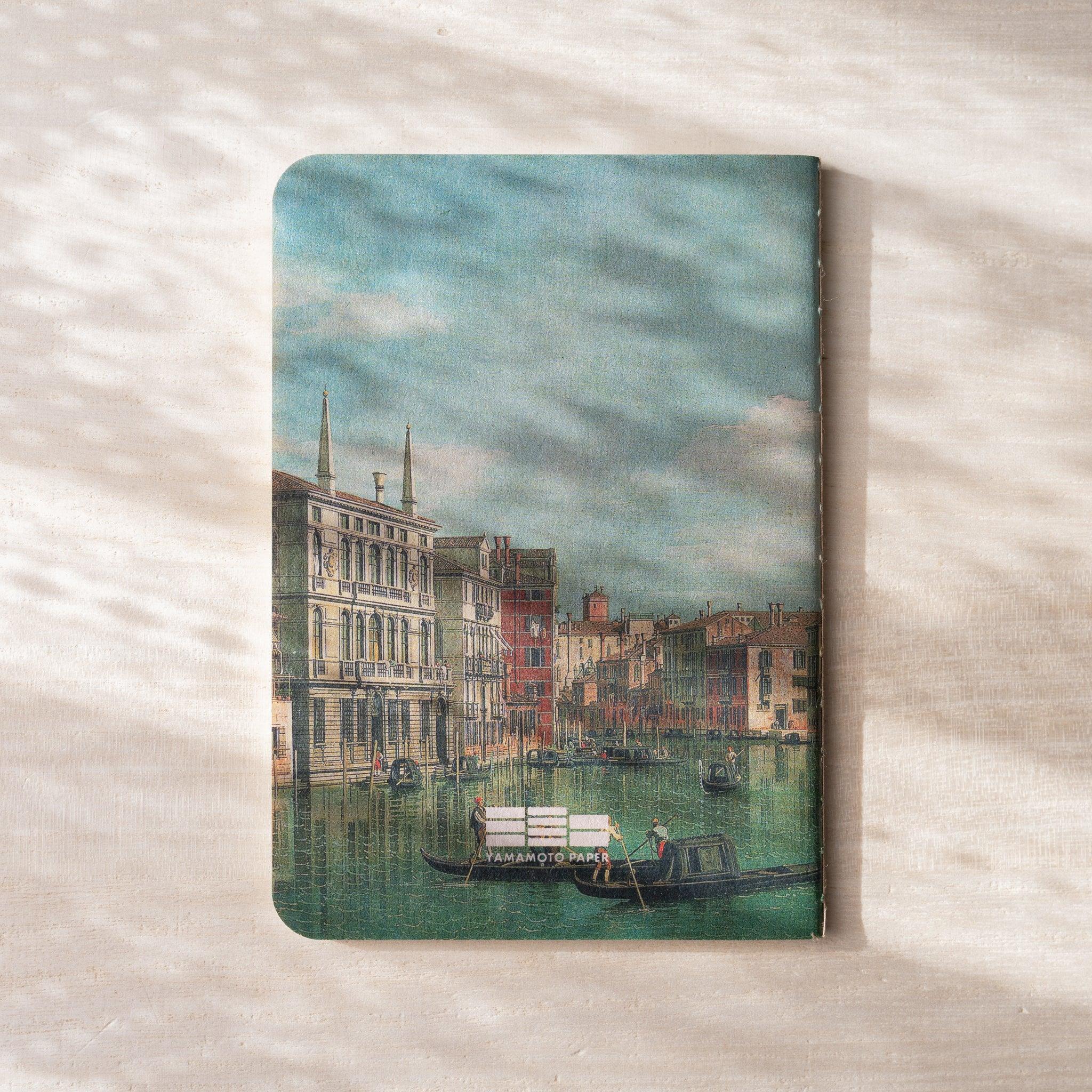 RO-BIKI NOTE back cover with Venetian canal scene showing gondolas and historic buildings, rounded corners