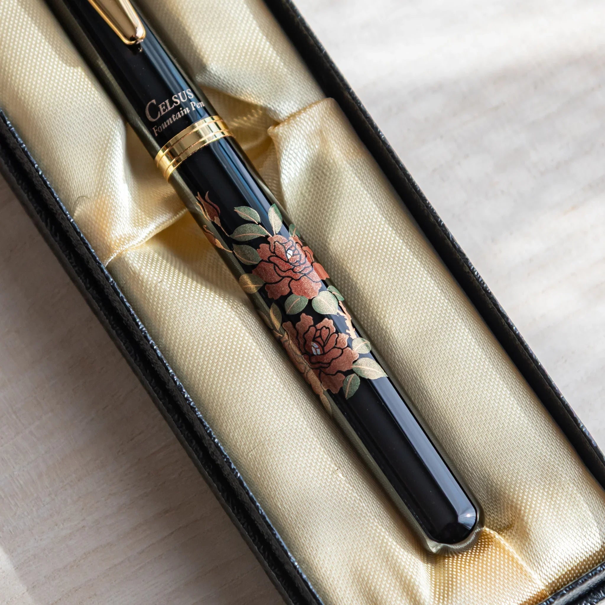 Rose Yamanaka fountain pen with lacquer design shown in composition displayed composition view product composition view