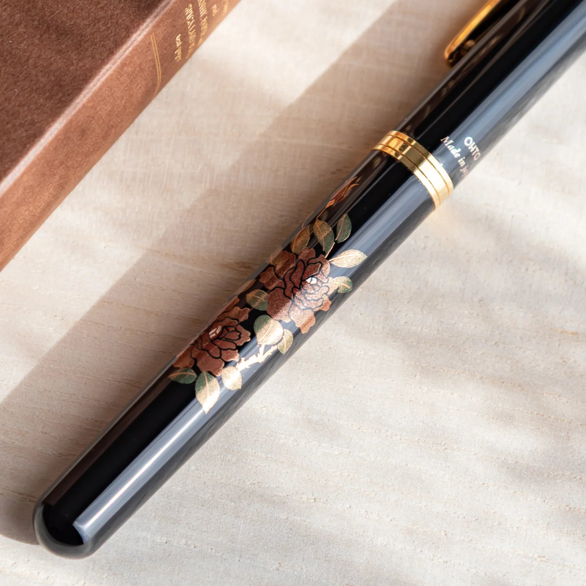 Rose Yamanaka fountain pen with lacquer design shown in composition in composition view product composition view