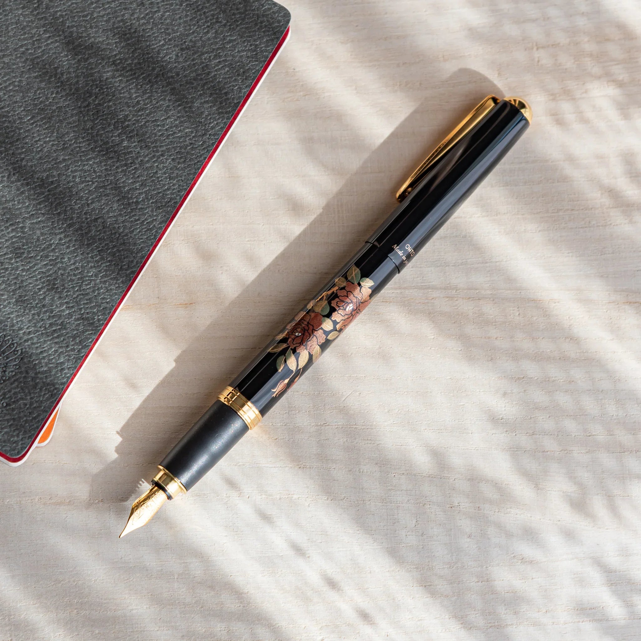 Rose Yamanaka fountain pen with lacquer design shown in composition in detail view composition product composition view