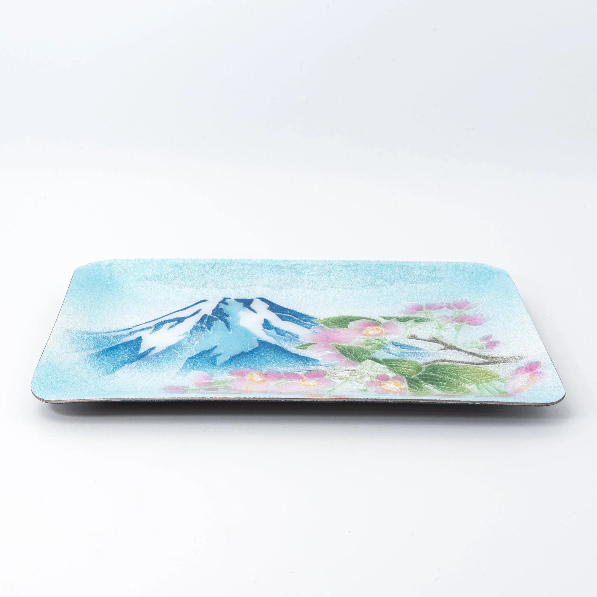 Japanese shippo ware pen tray viewed from the side on white surface, showing tray depth and Mt. Fuji and sakura design