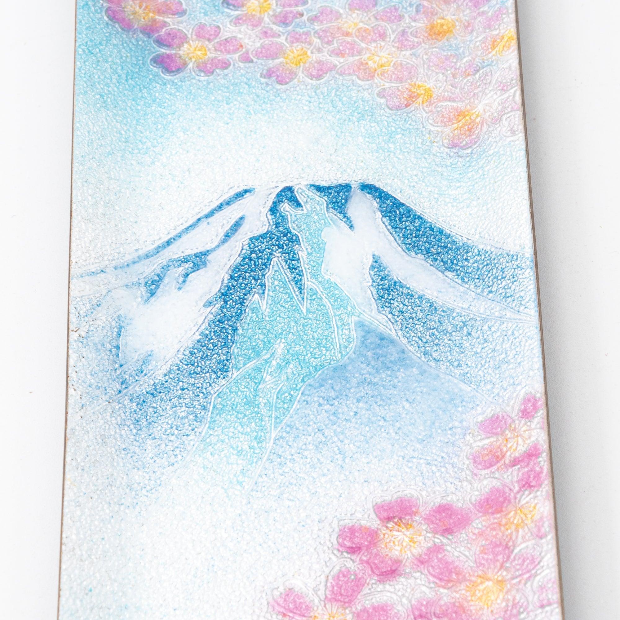 Close-up of sakura and Fuji shippo ware slim pen tray showing Mt. Fuji snow cap detail with blue enamel texture and sakura