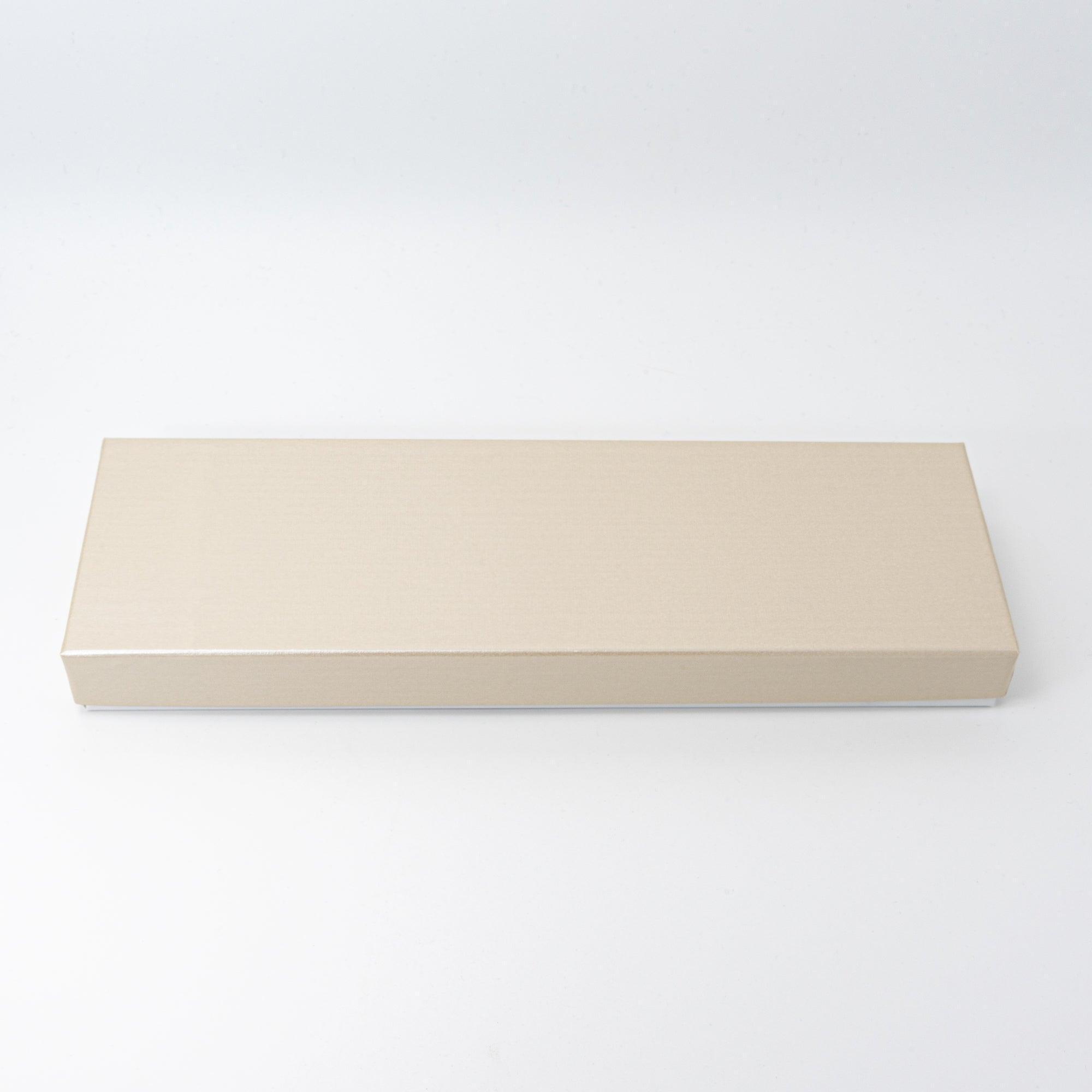 Simple beige rectangular box, likely packaging for the decorative tray, part of Japanese stationery.